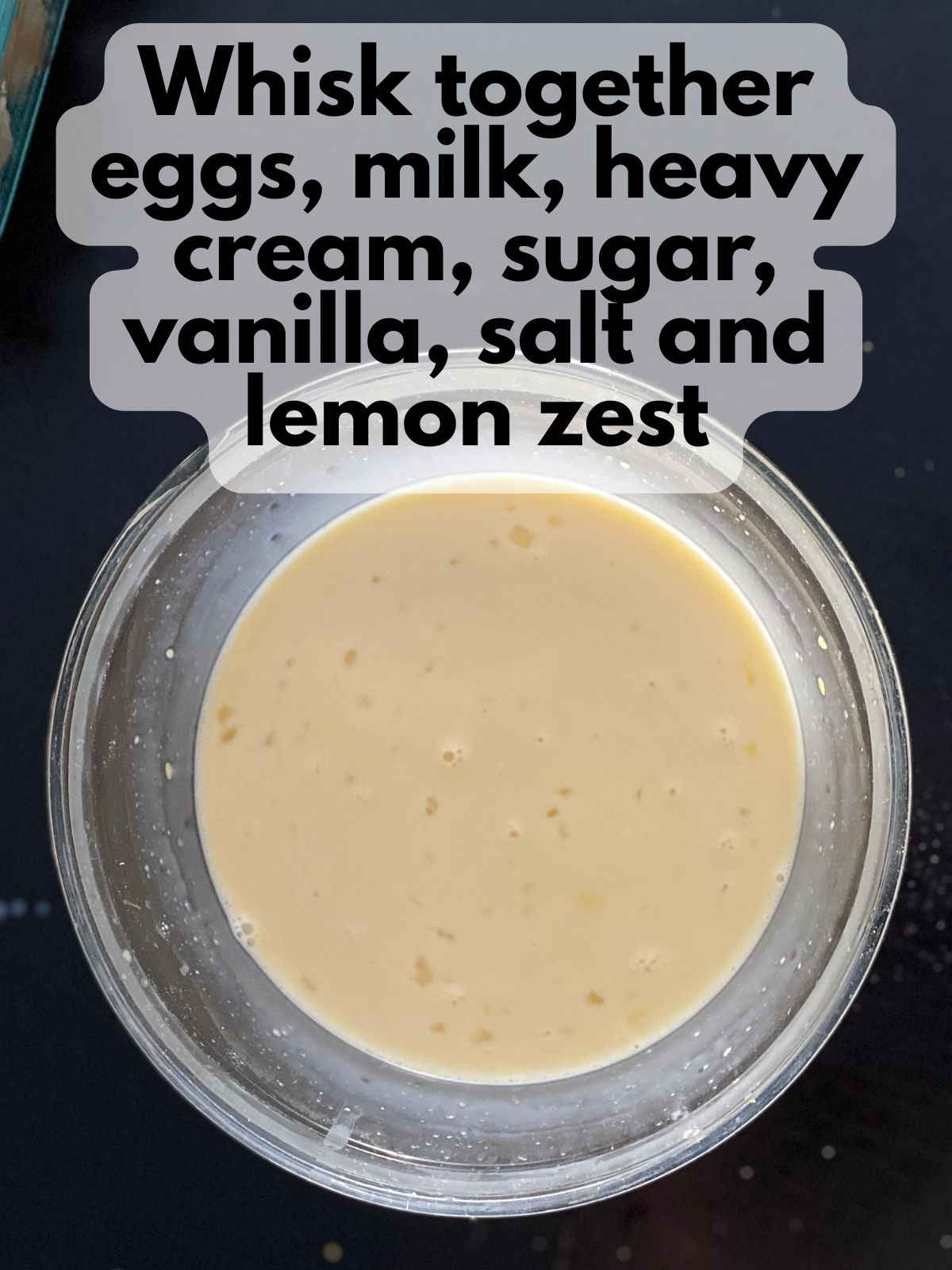 eggs mixed with milk, heavy cream, sugar, vanilla, salt and lemon zest