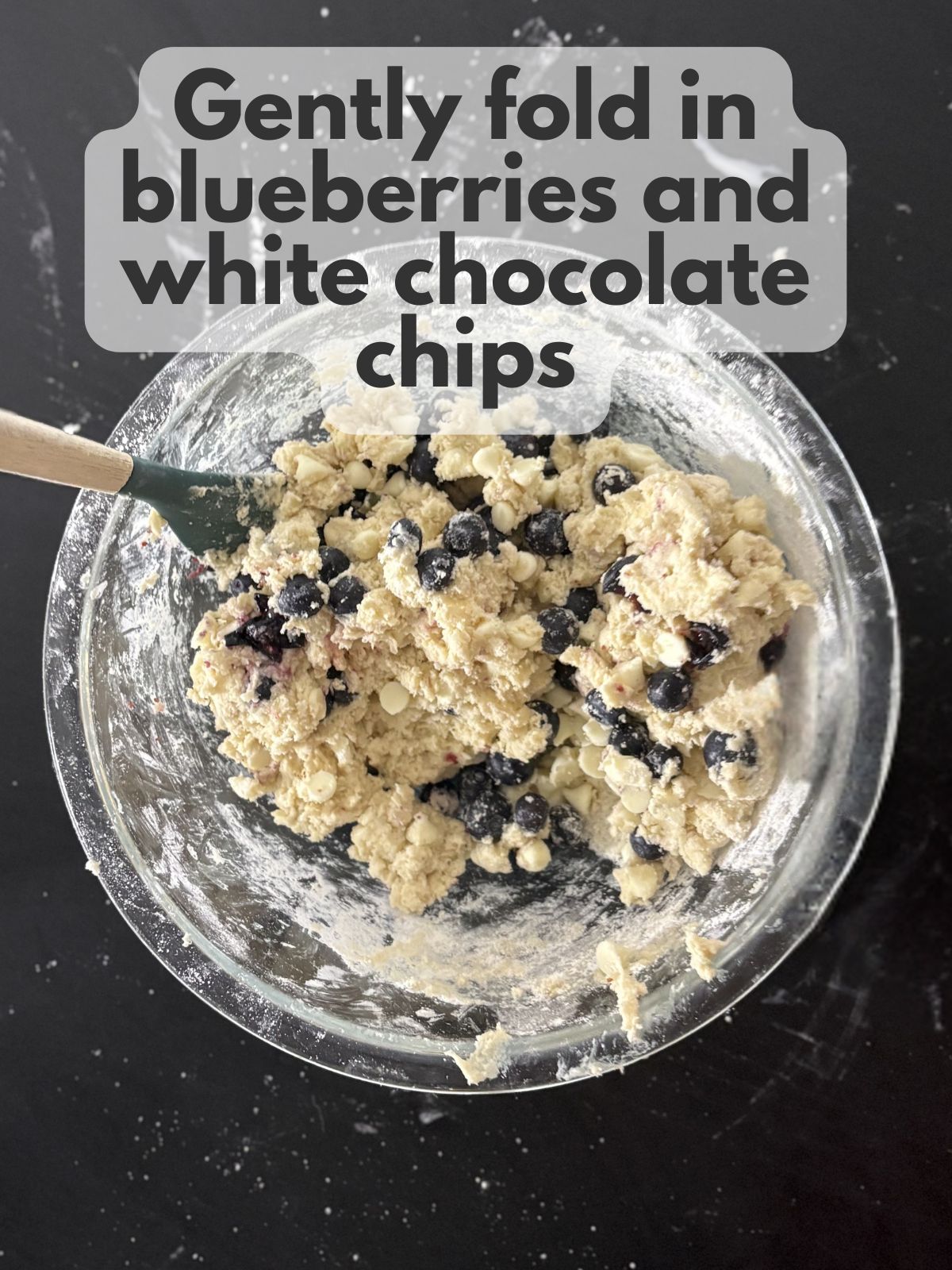 blueberries and white chocolate chips folded into scone dough