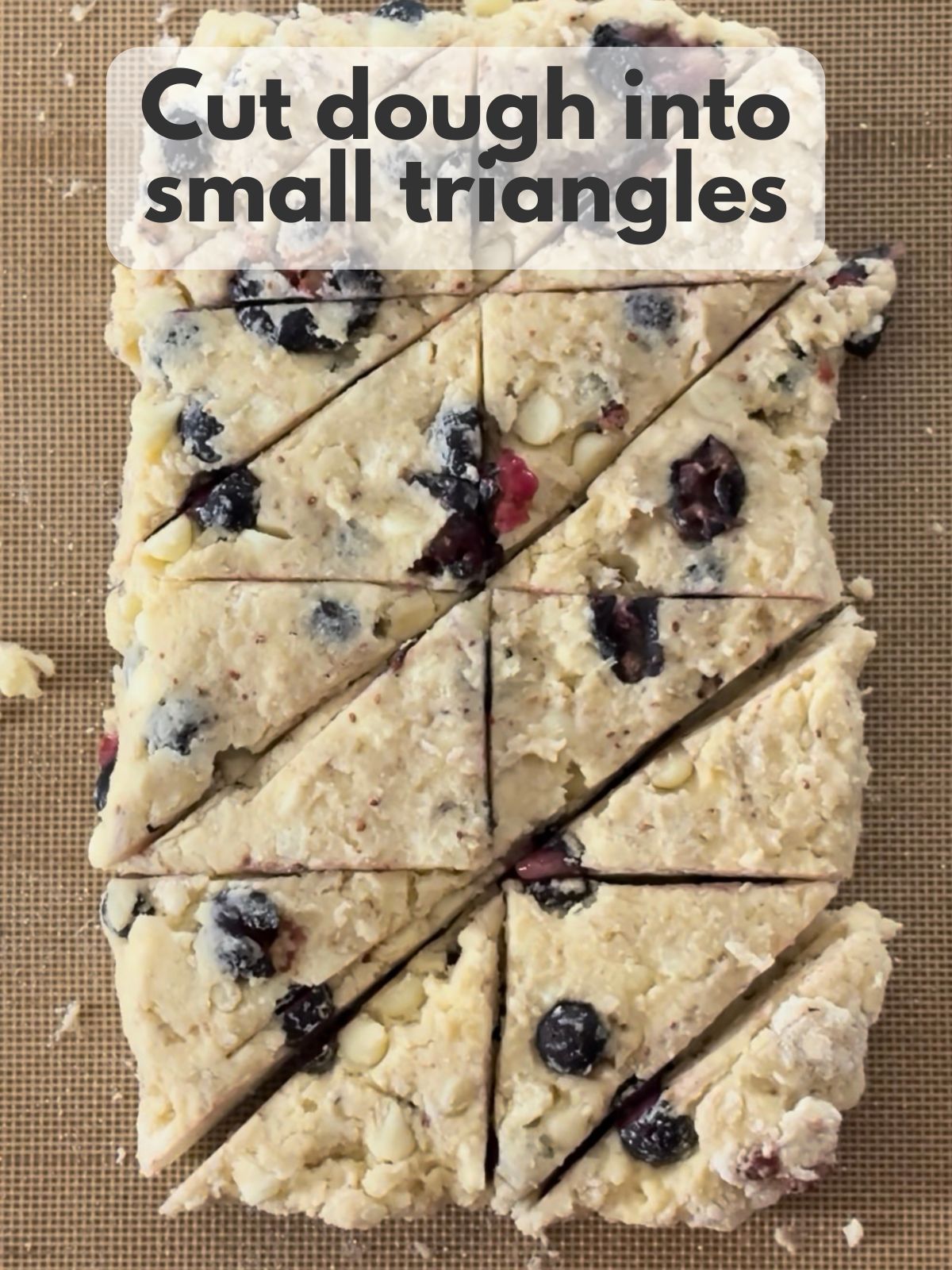 blueberry white chocolate scone dough cut into triangles