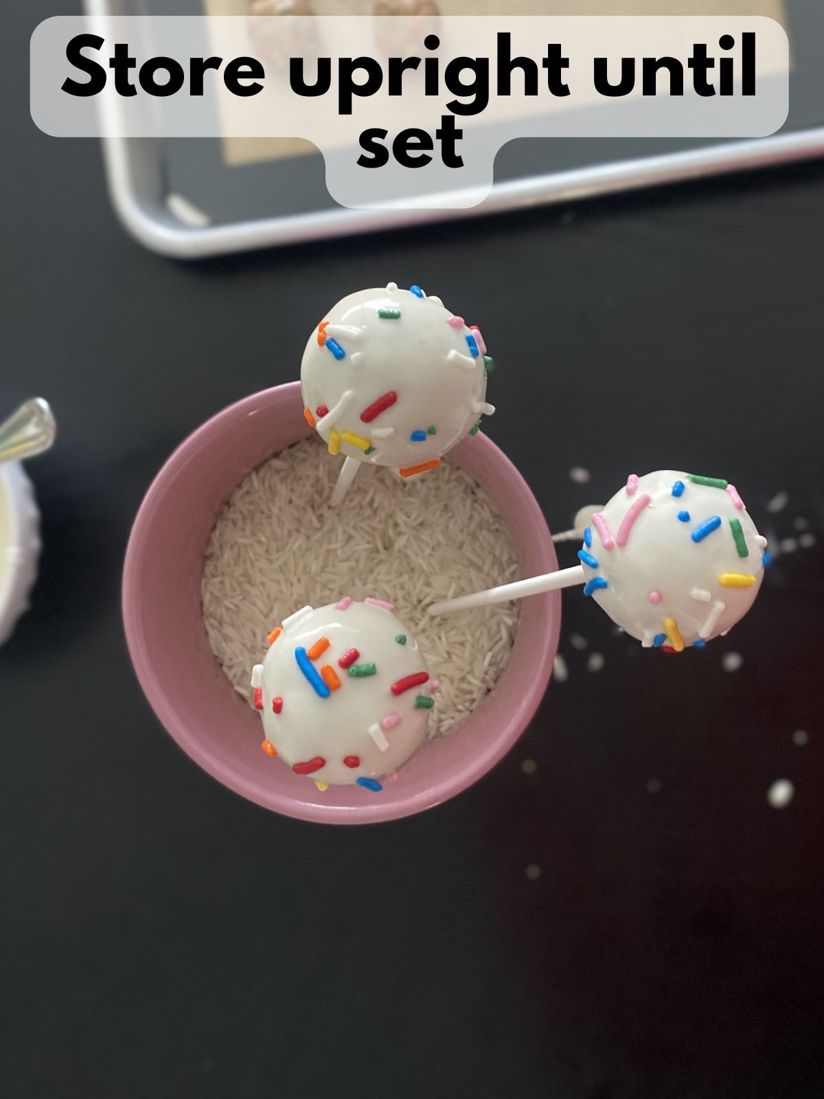 funfetti cake pops resting upright