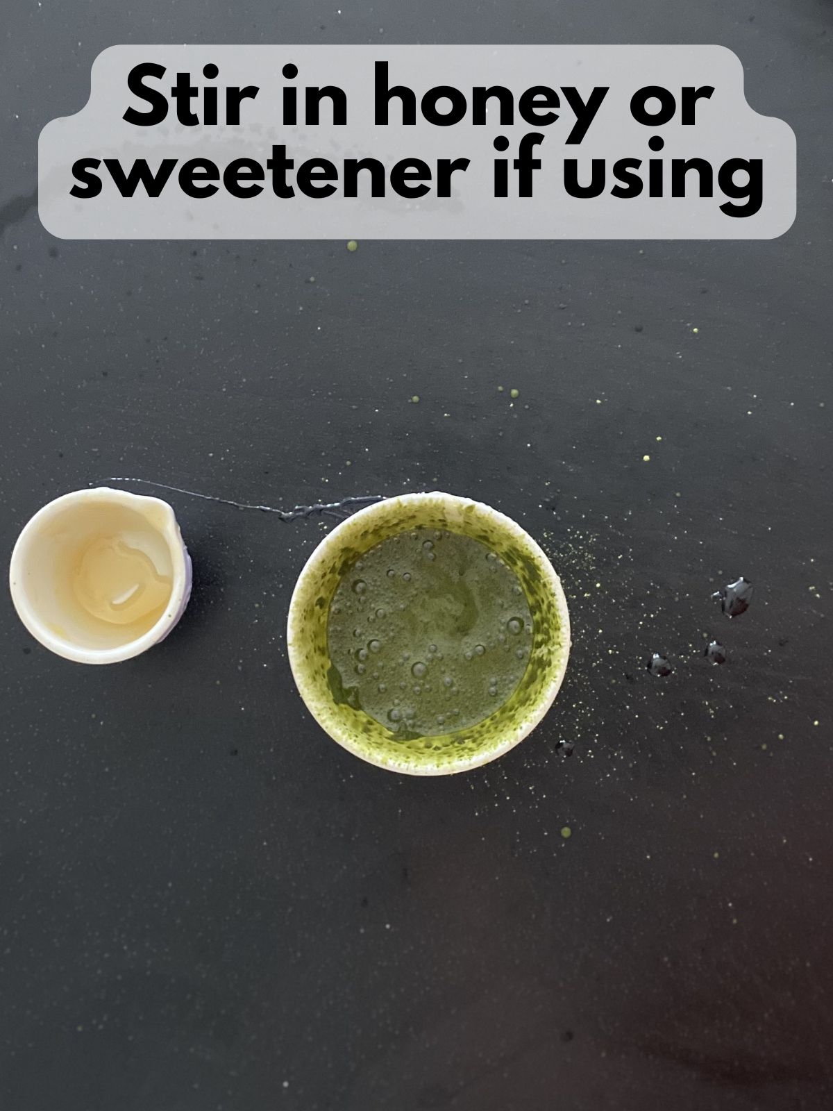 honey mixed into matcha and hot water