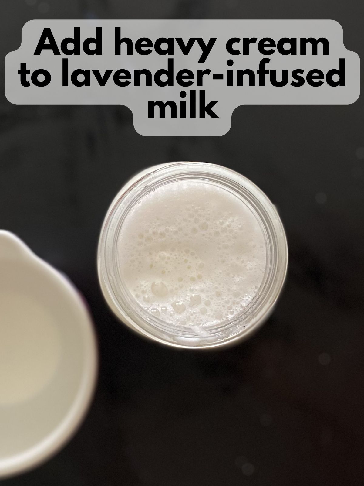 heavy cream mixed with lavender-infused milk in a mason jar