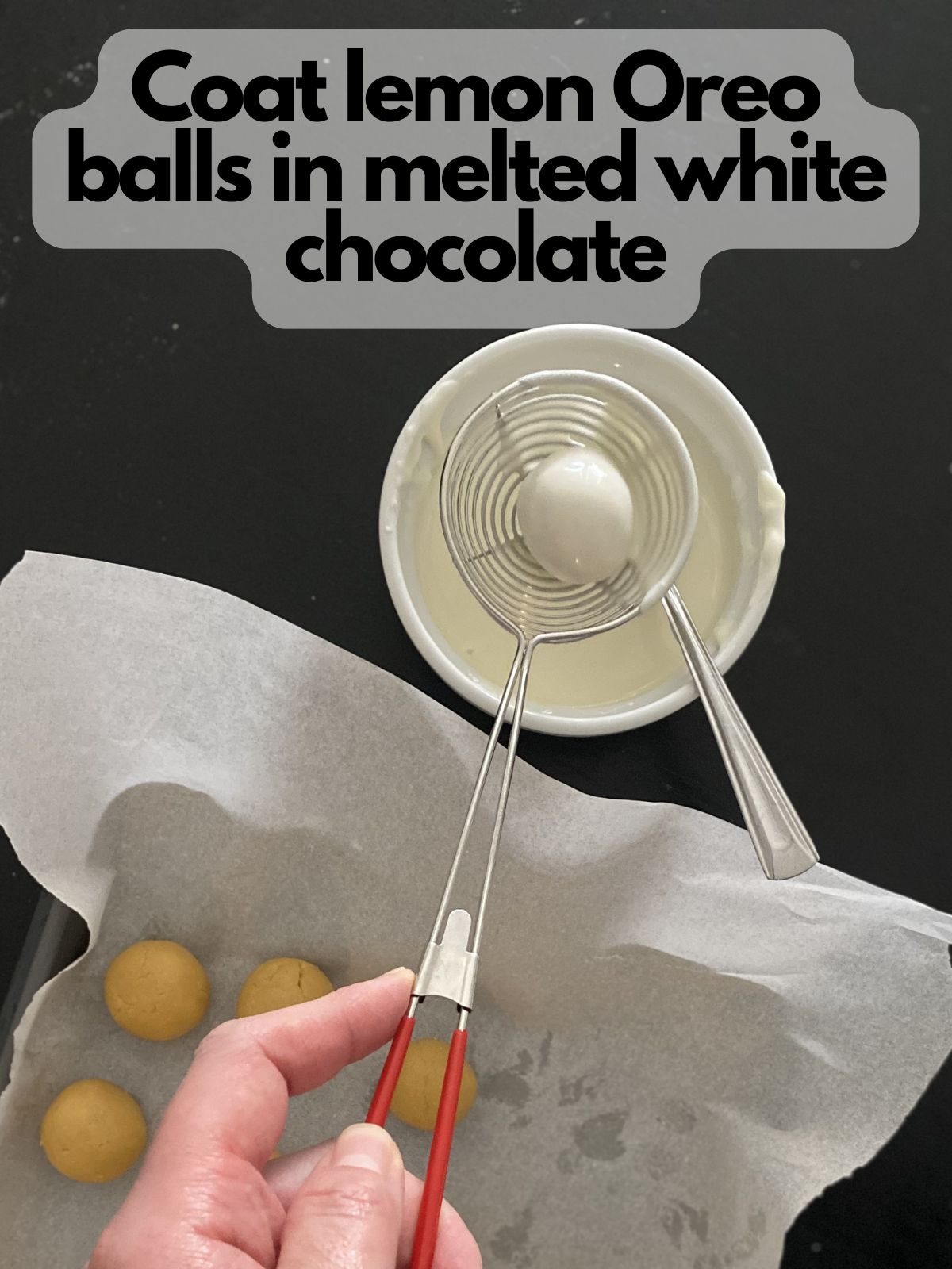 lemon Oreo balls being dipped in white chocolate