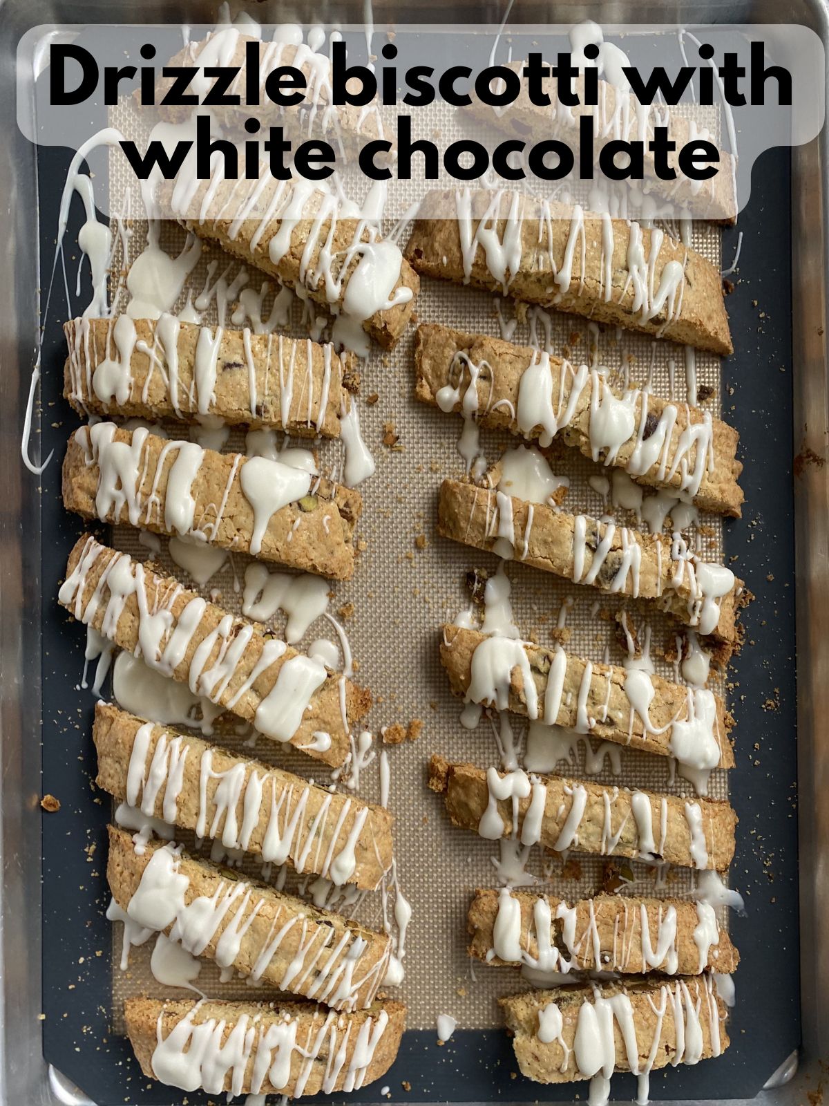 white chocolate drizzled over pistachio biscotti