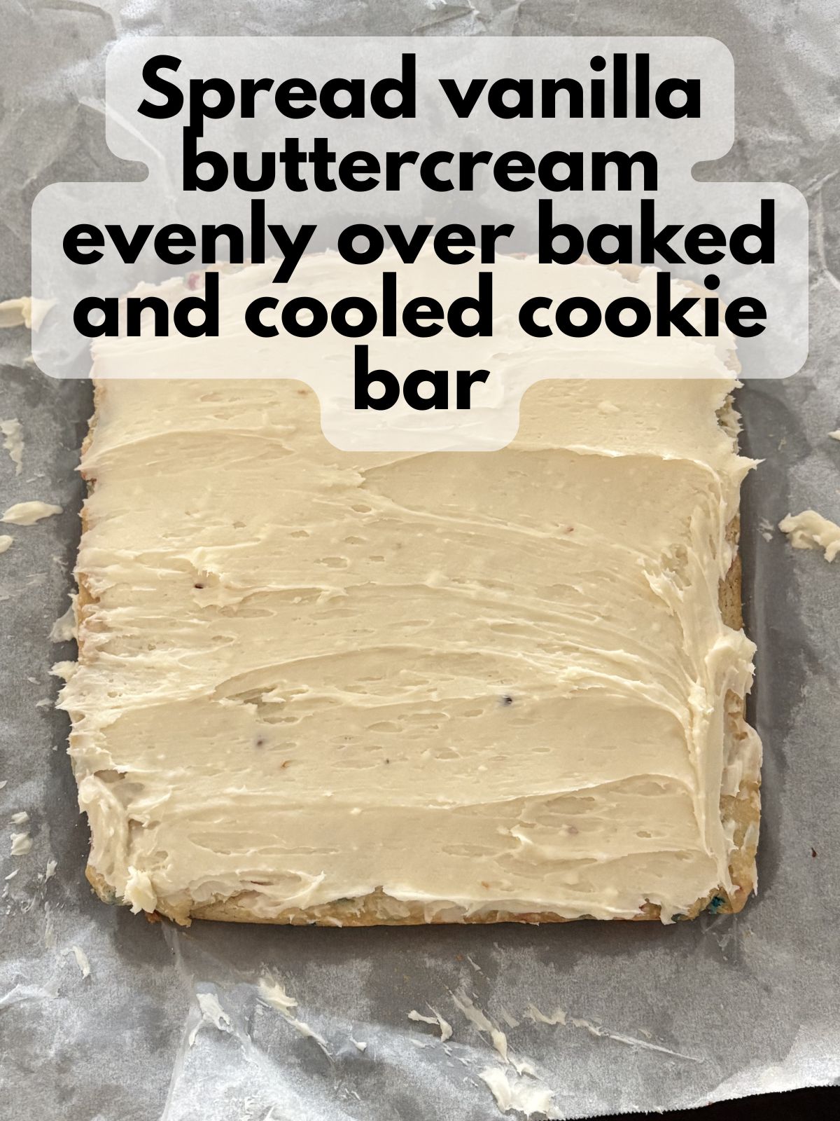 vanilla buttercream spread one top of 4th of July cookie bars