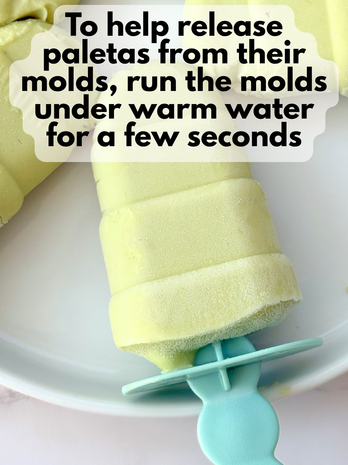 avocado paletas on a plate