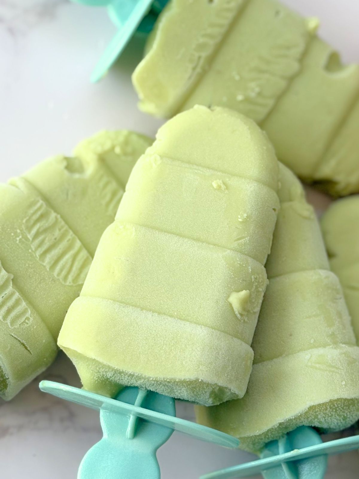 creamy avocado paletas