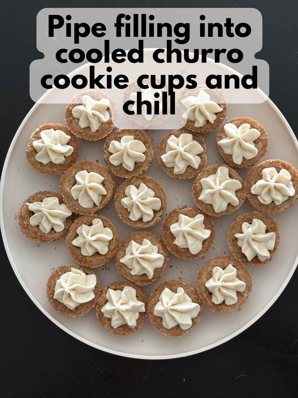 cream cheese filling piped into churro cookie cups