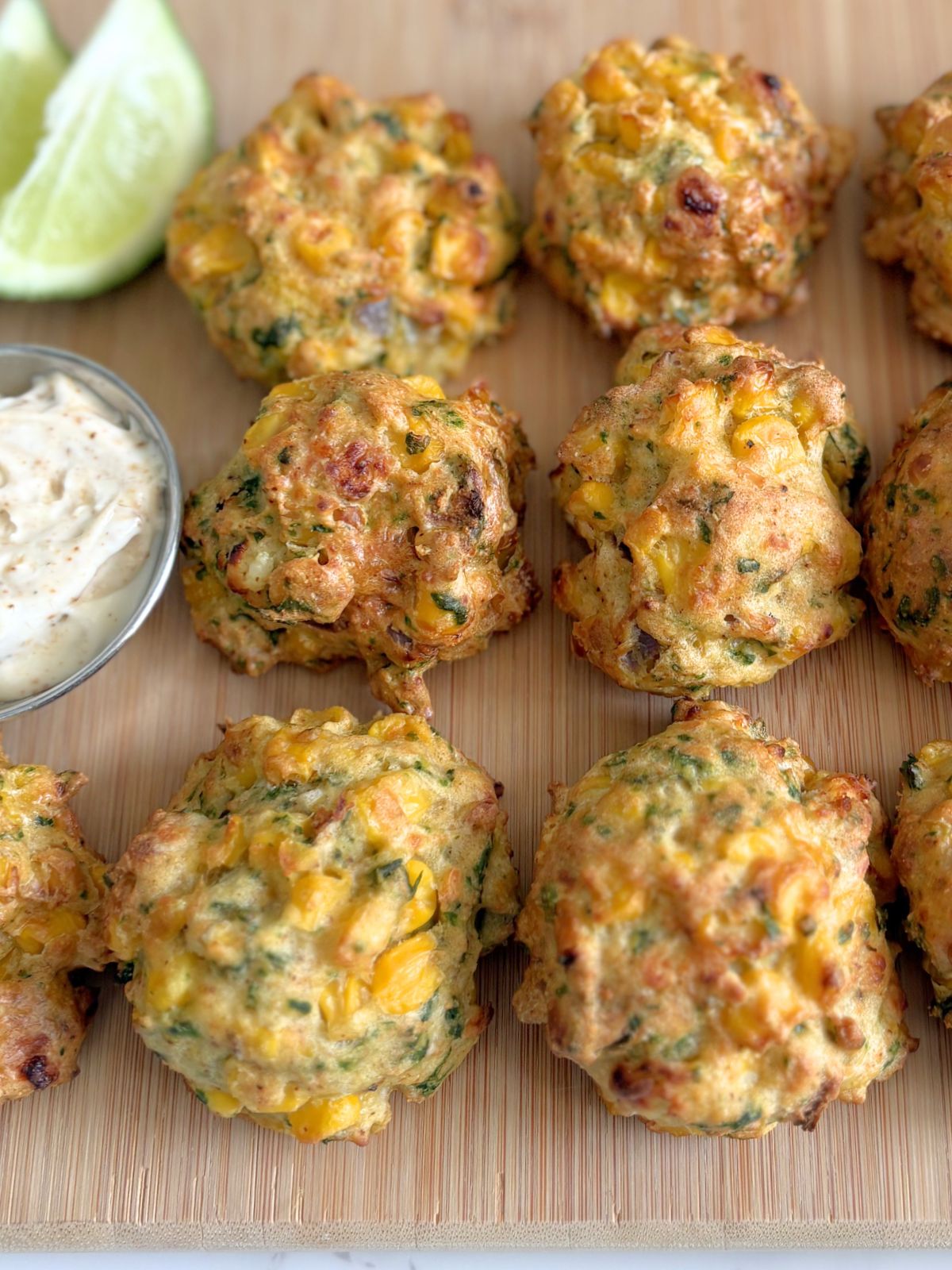 fried elote fritters on a tray