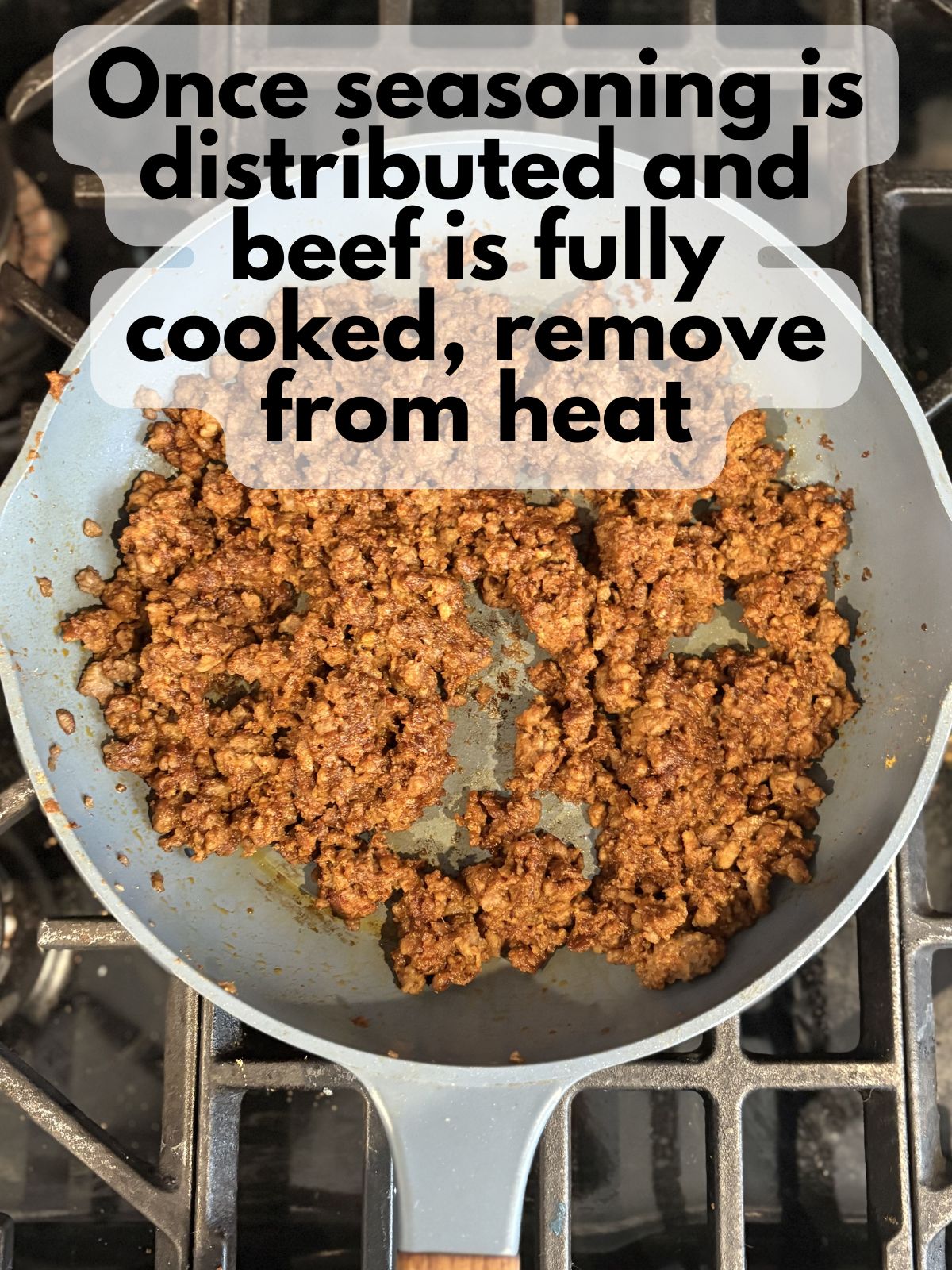 seasoned taco meat cooling in a pan