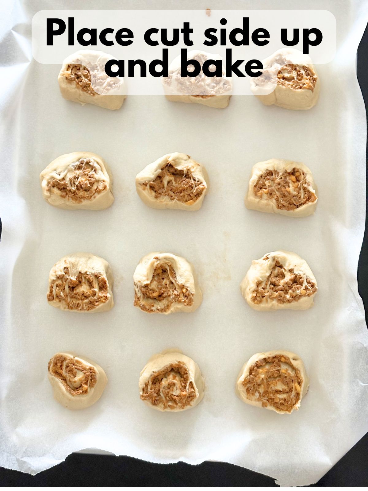 uncooked taco pinwheels on a baking sheet
