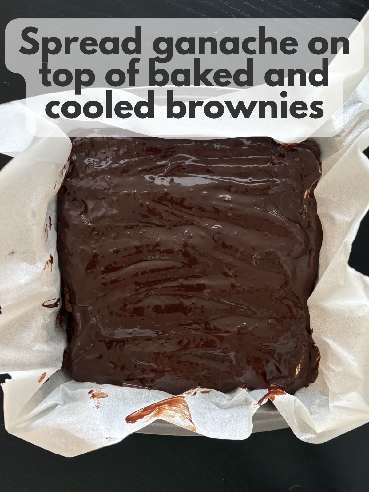 chocolate ganache spread over baked, cooled brownies