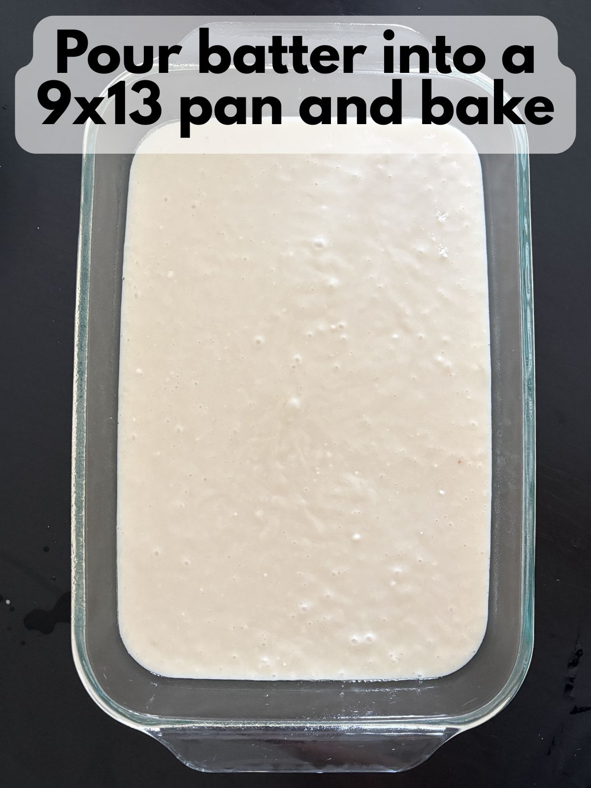 white cake batter in a 9x13 pan