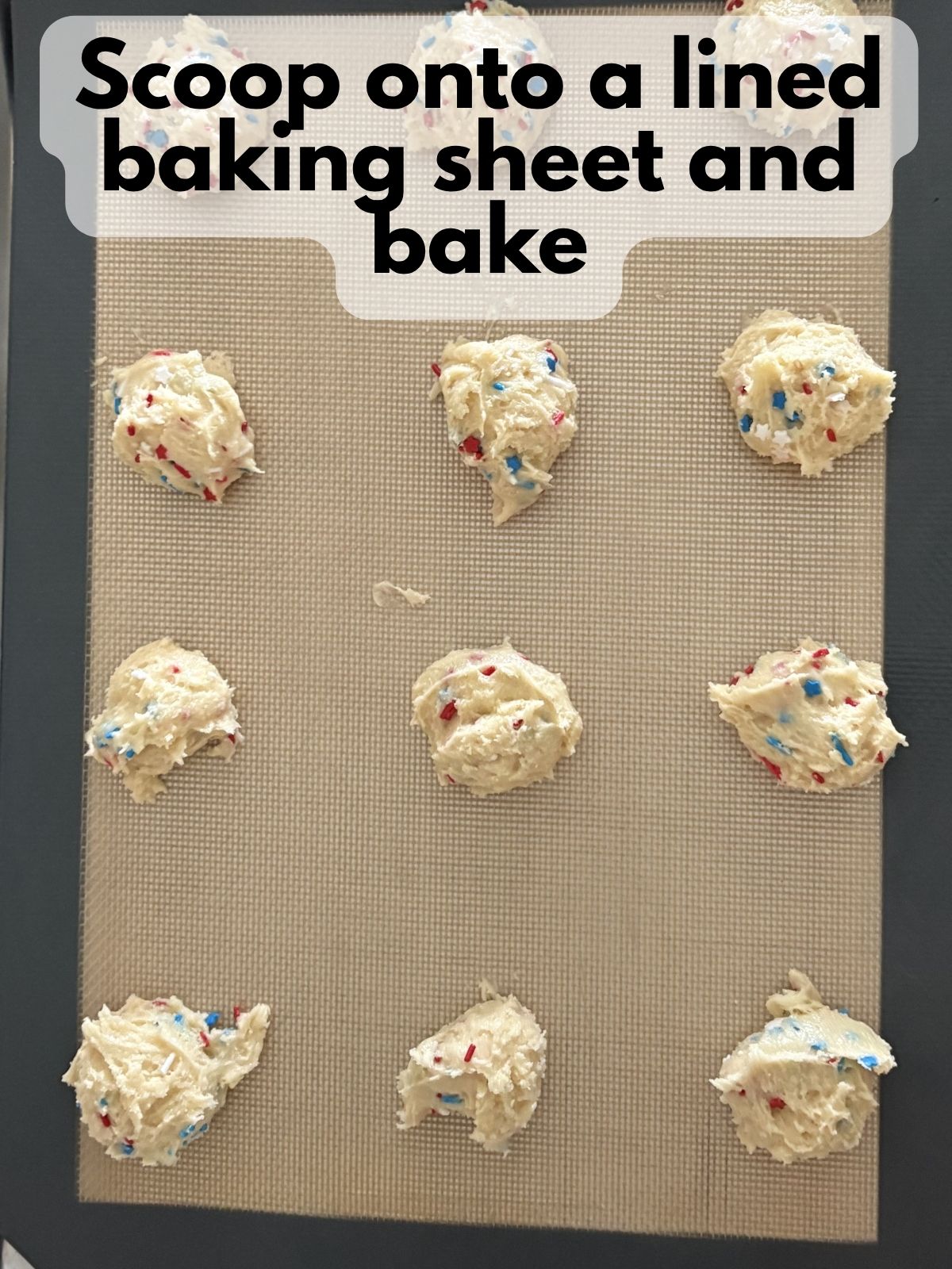 4th of July cake mix cookie dough scooped onto a baking sheet