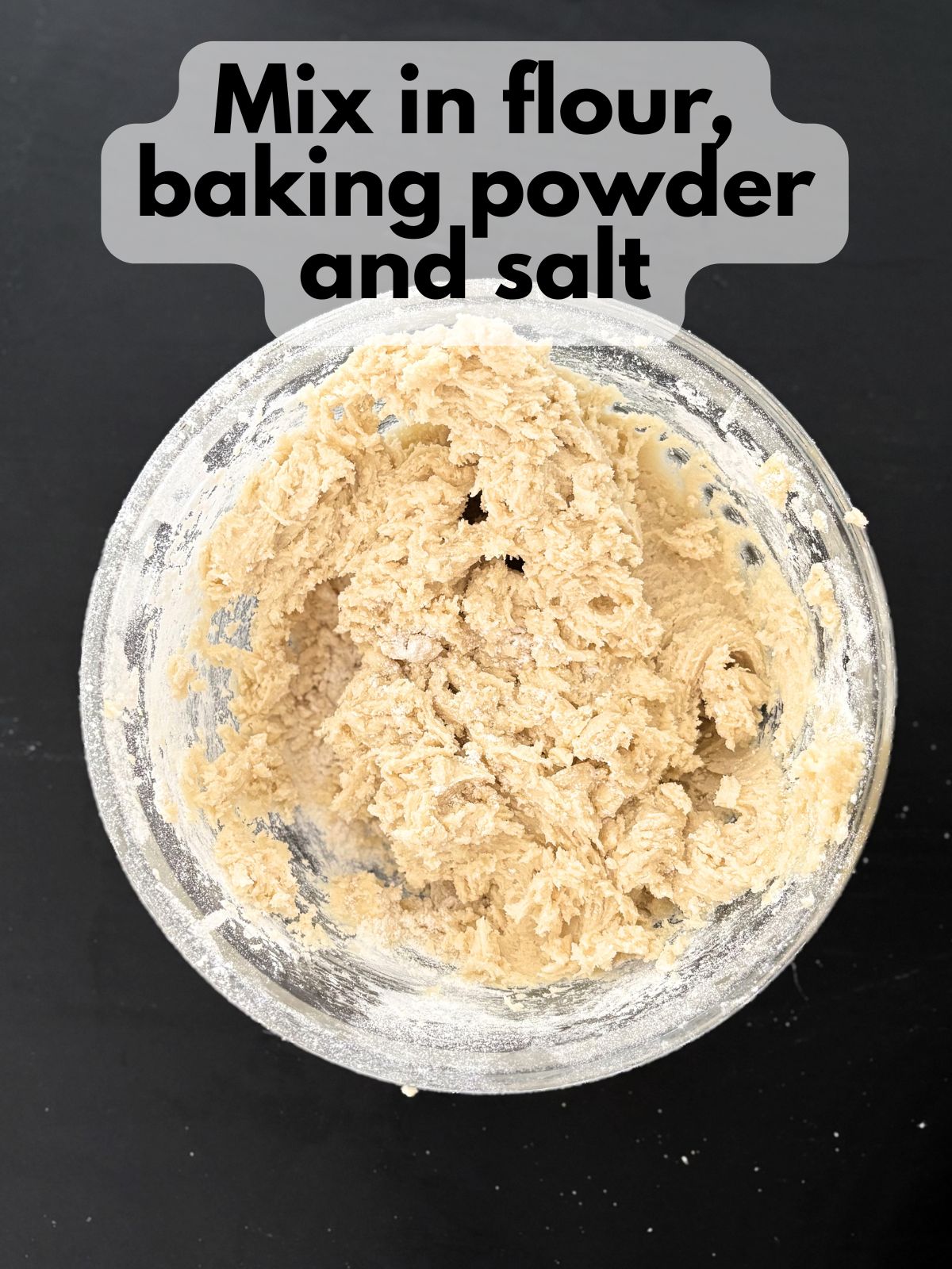 dry ingredients mixed in with butter, sugar, vanilla and eggs