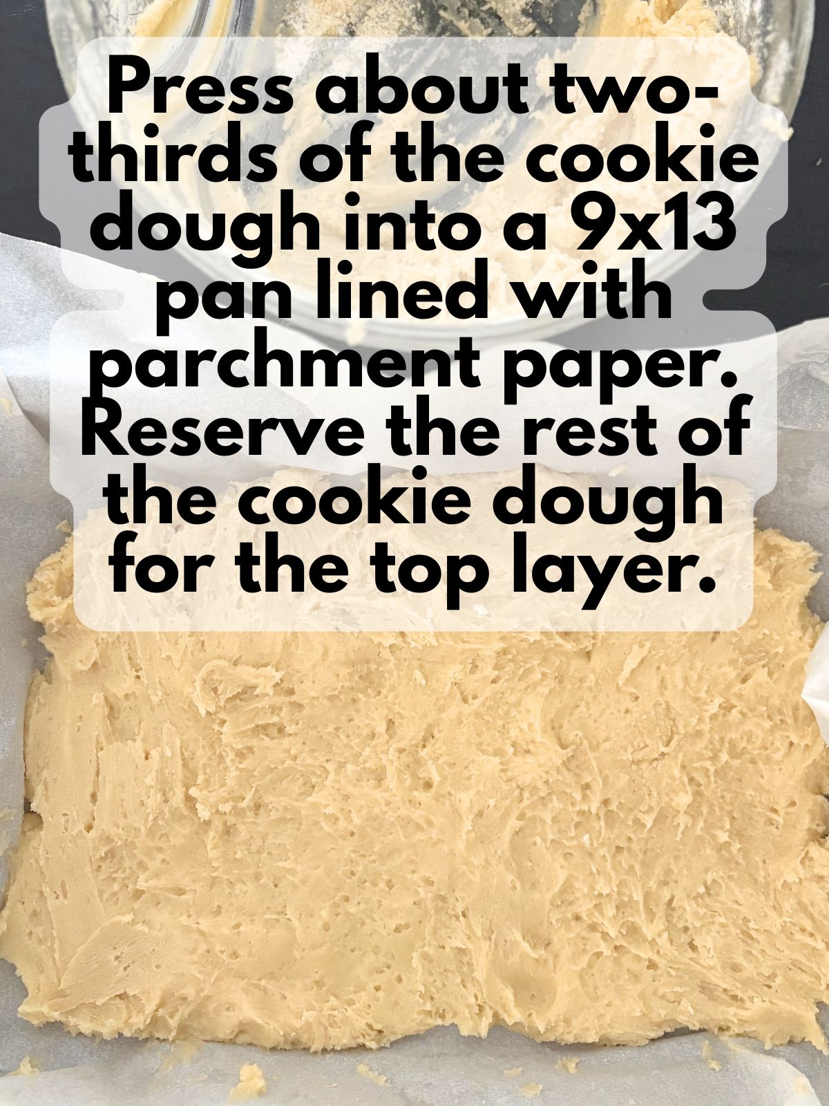sugar cookie dough spread in a 9x13 pan
