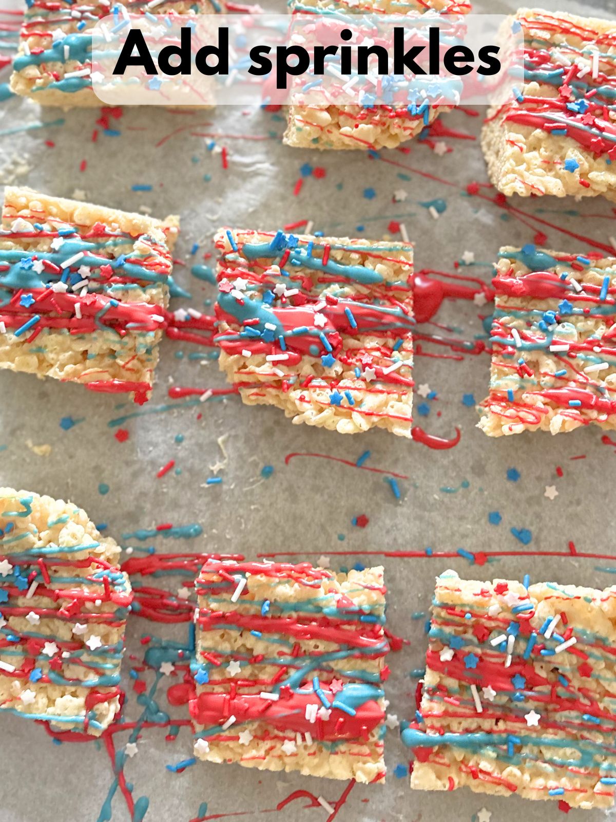 sprinkles added to red and blue chocolate drizzle