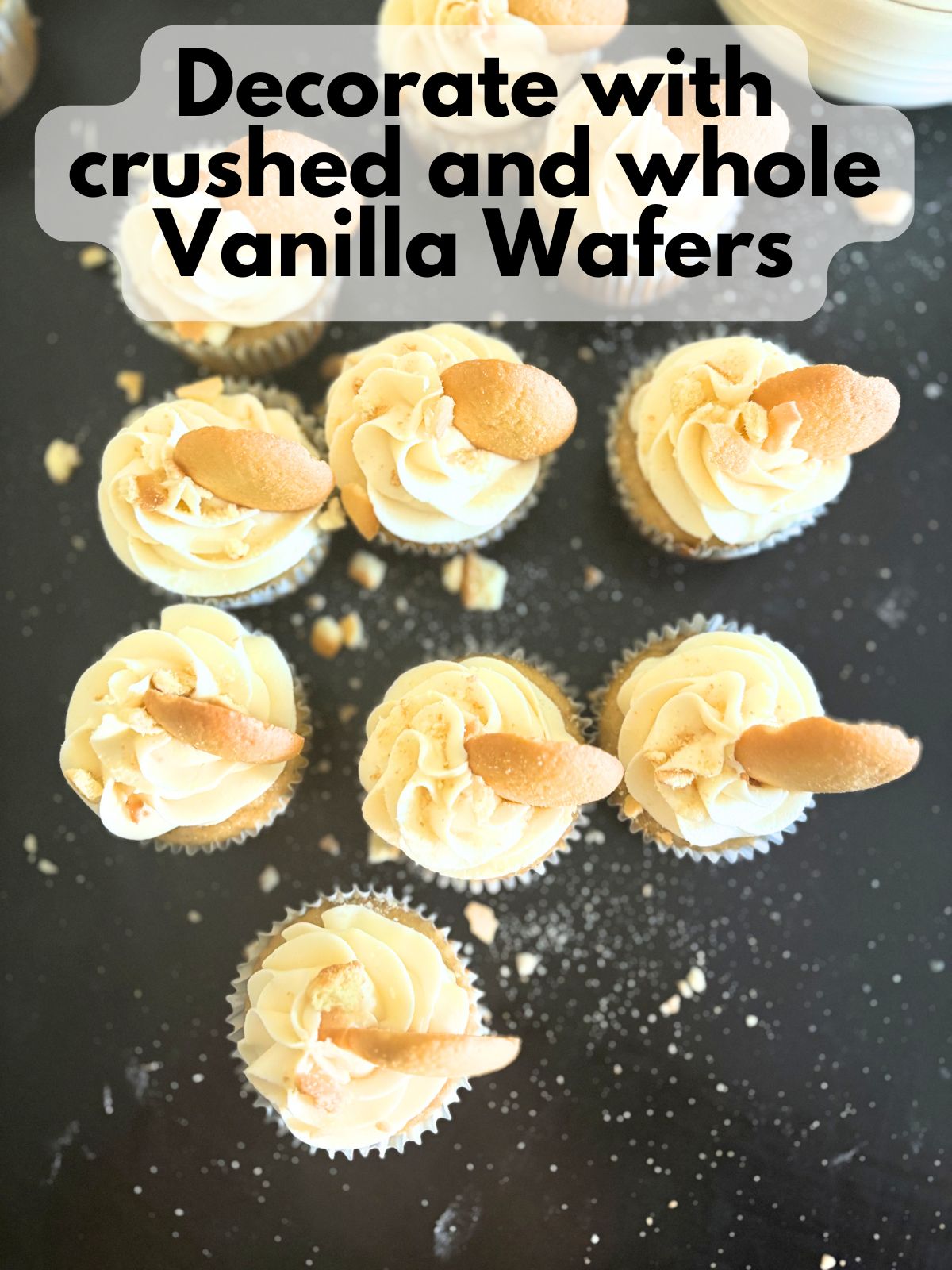 banana pudding cupcakes decorated with crushed and whoe vanilla wafter cookies