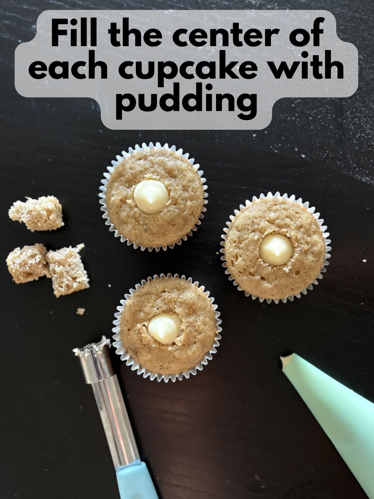 pudding piped into the middle of cupcakes