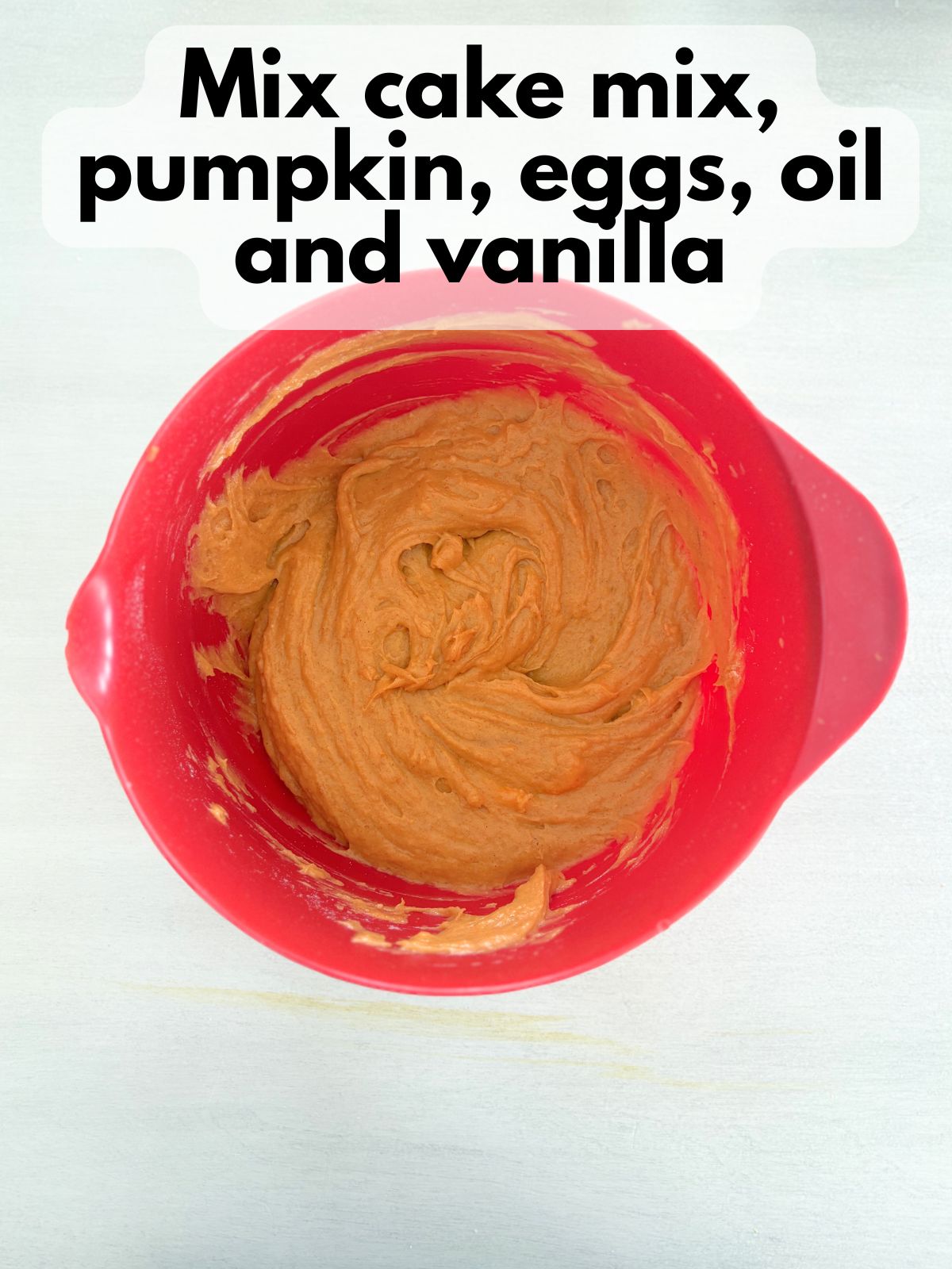 gluten free pumpkin cupcake batter in a mixing bowl
