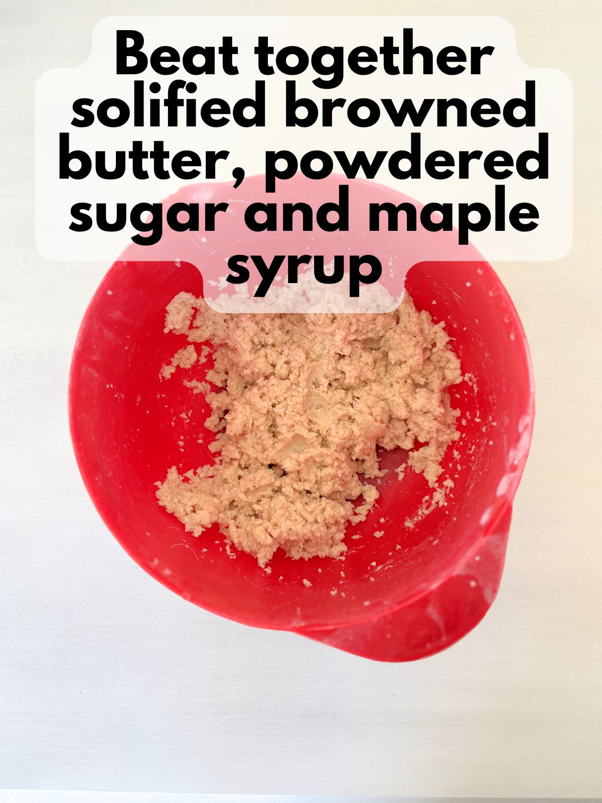brown butte maple frosting in a mixing bowl