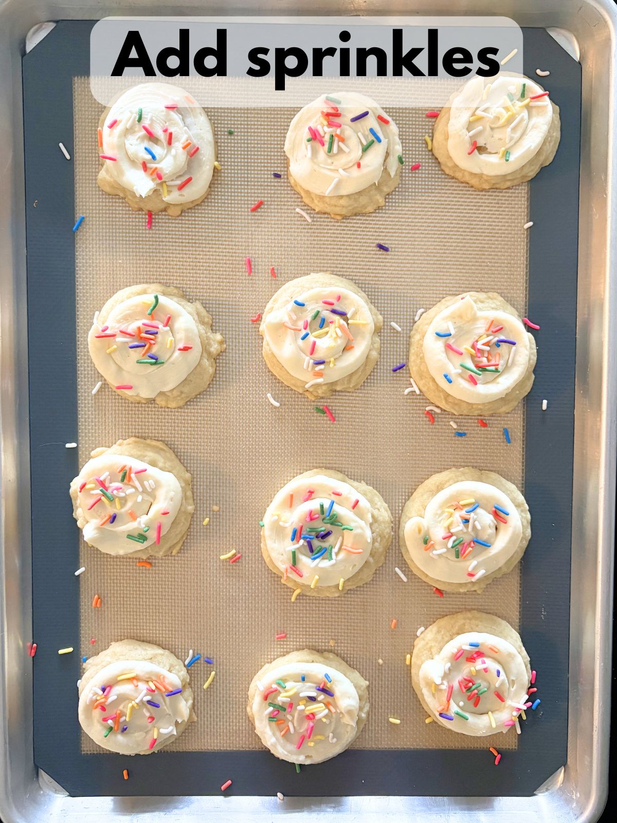 sprinkles on top of frosted sugar cookies