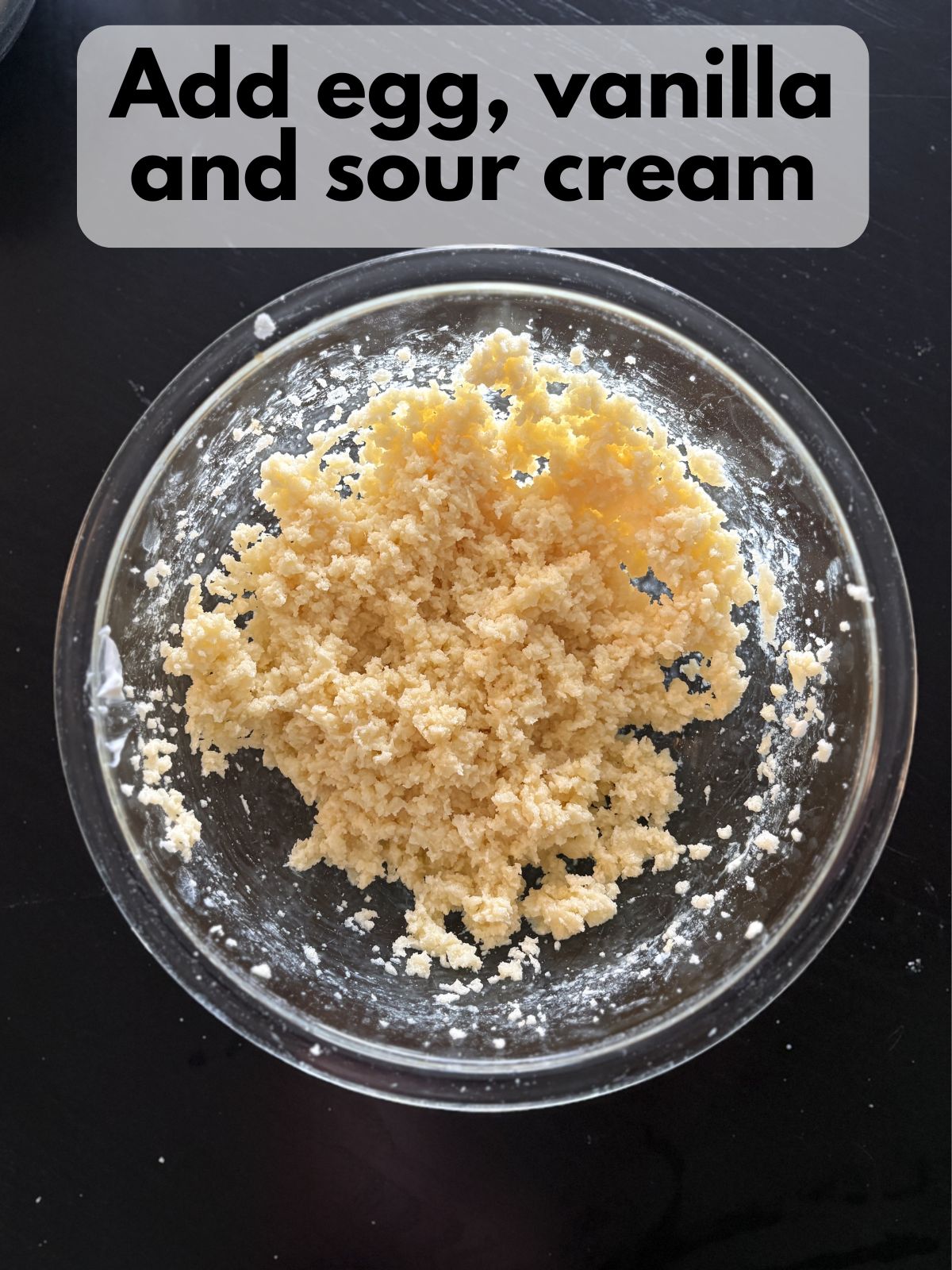 egg, vanilla and sour cream added to creamed butter and sugar