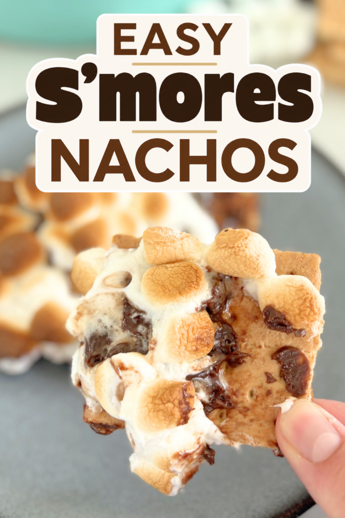 These easy s’mores nachos are made with graham crackers, milk chocolate sauce, and toasted marshmallows for a fun oven smores dessert.