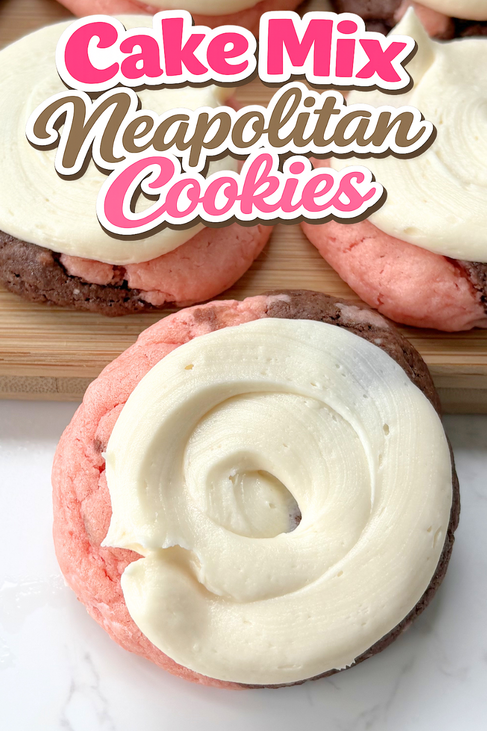 Neapolitan Cake Mix Cookies are soft, two-tone chocolate and strawberry cake mix cookies topped with vanilla buttercream. An easy, pretty dessert perfect for busy bakers who love cute, quick cake mix desserts.