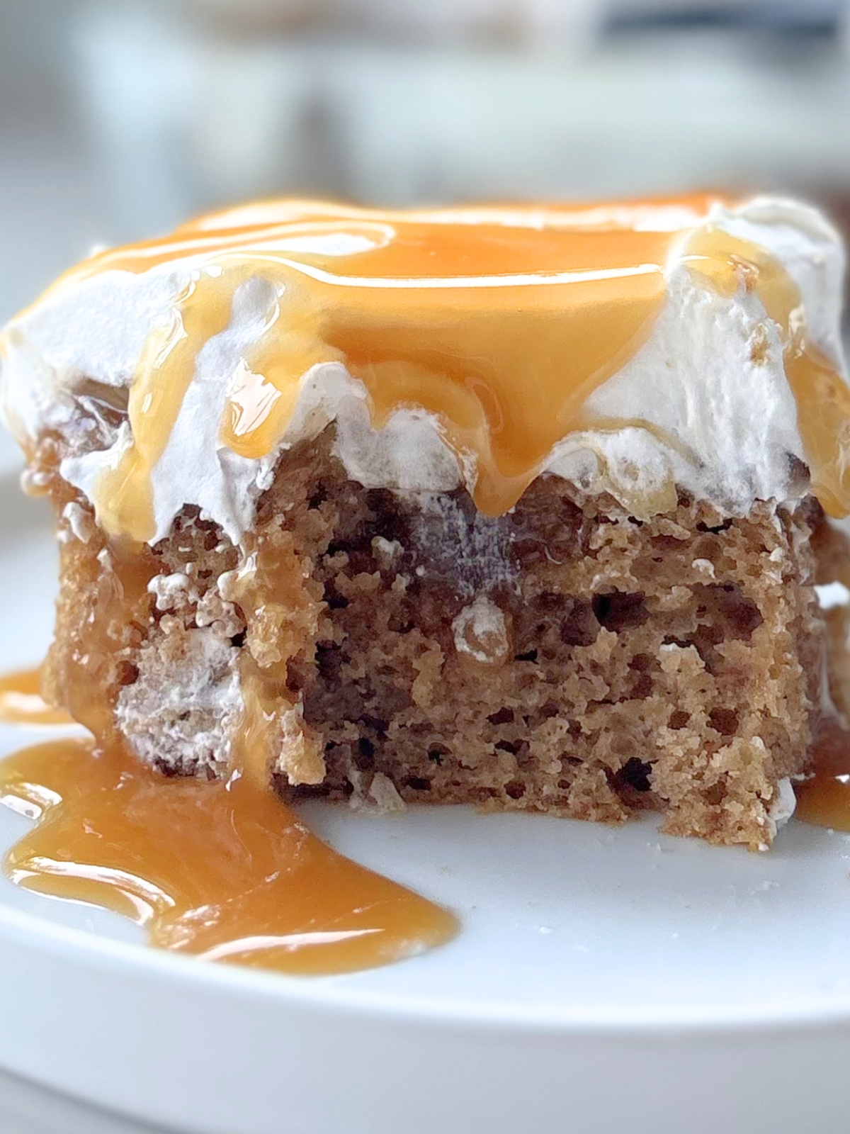apple caramel poke cake on a plate