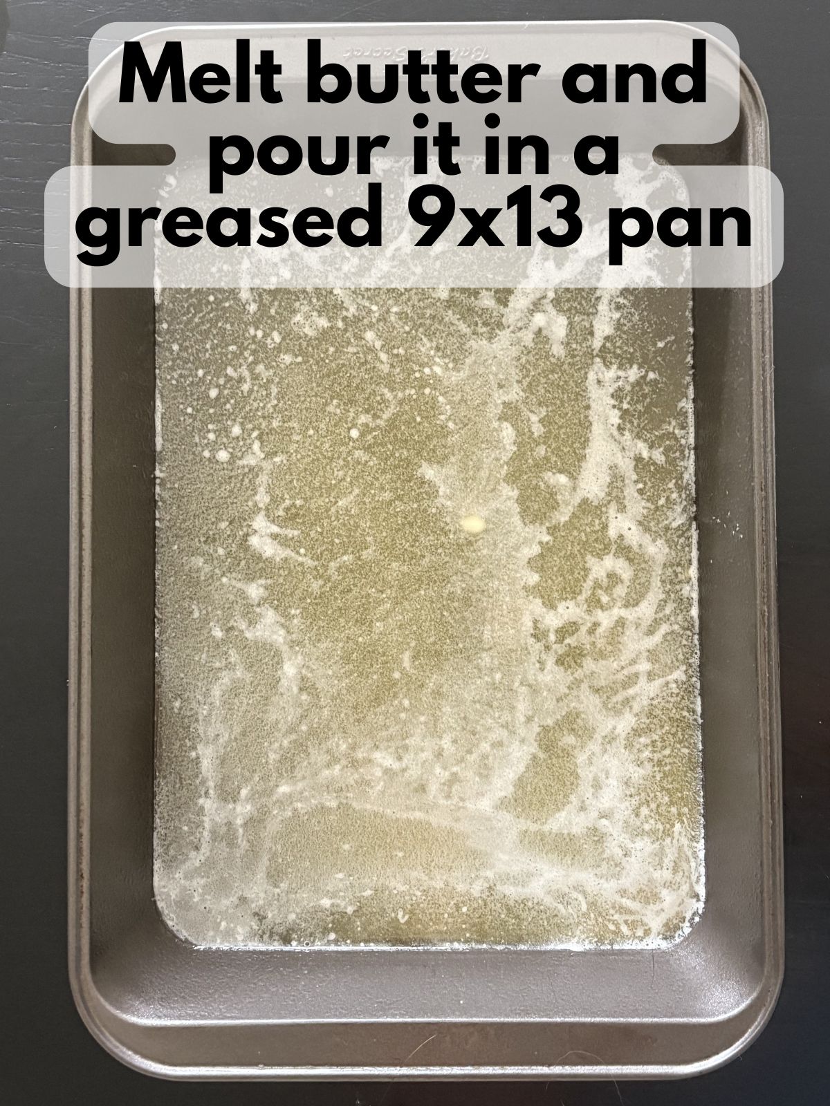 melted butter in a 9x13 pan