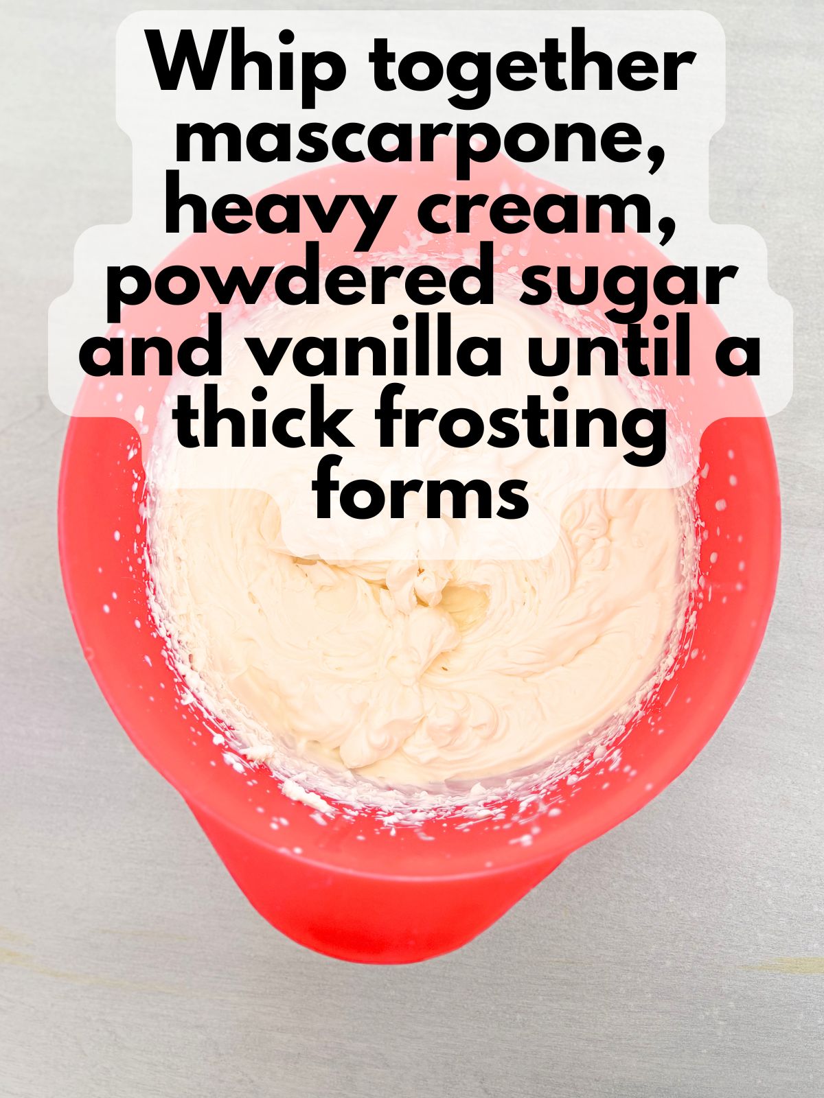 mascarpone frosting in a mixing bowl