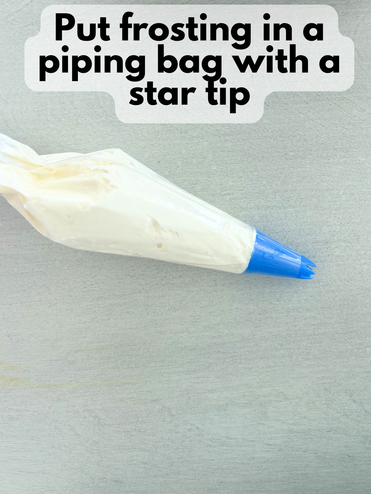 mascarpone frosting in a piping bag with a star tip