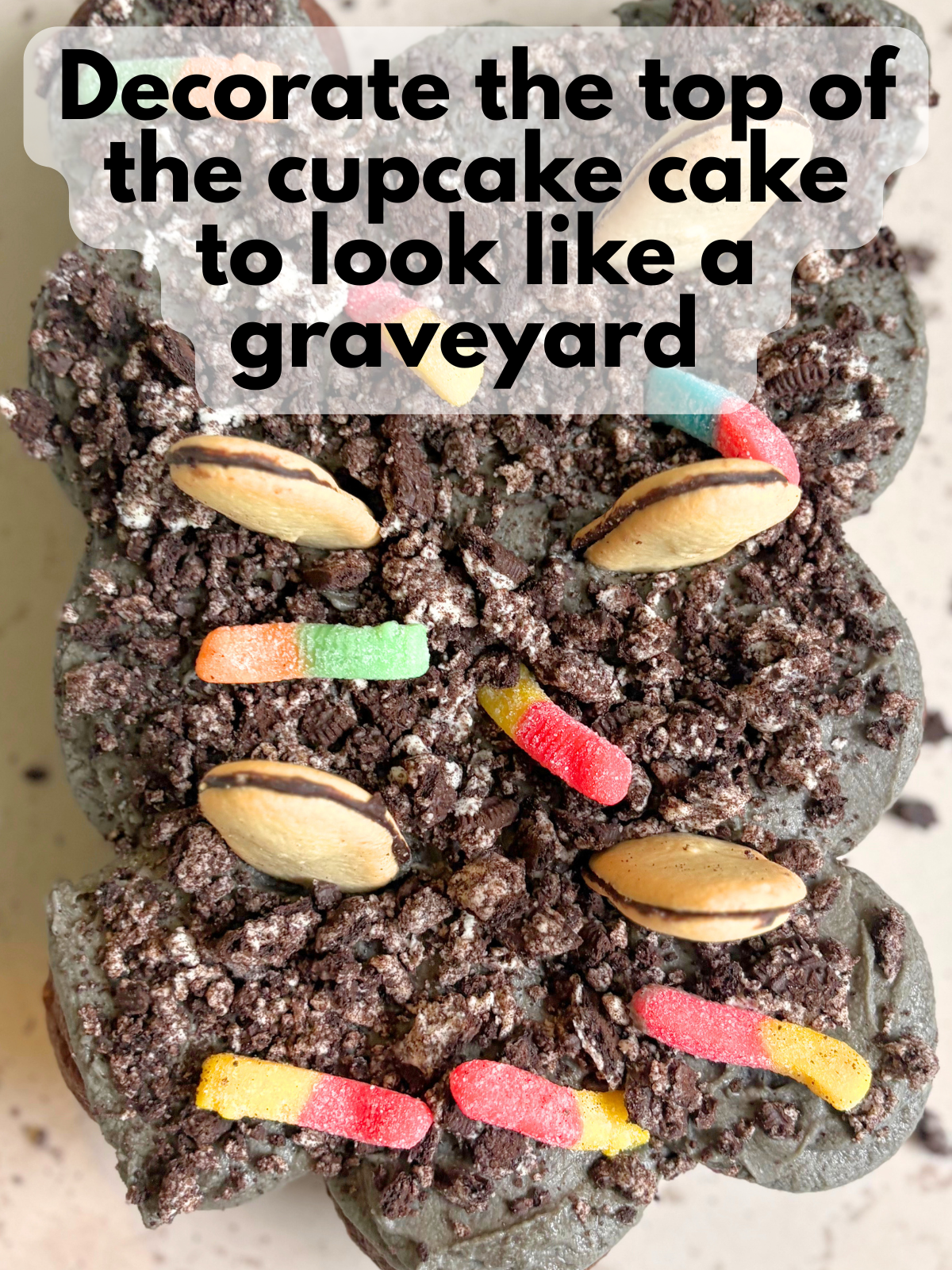 graveyard cupcake cake decorated with Milano cookies and gummy worms