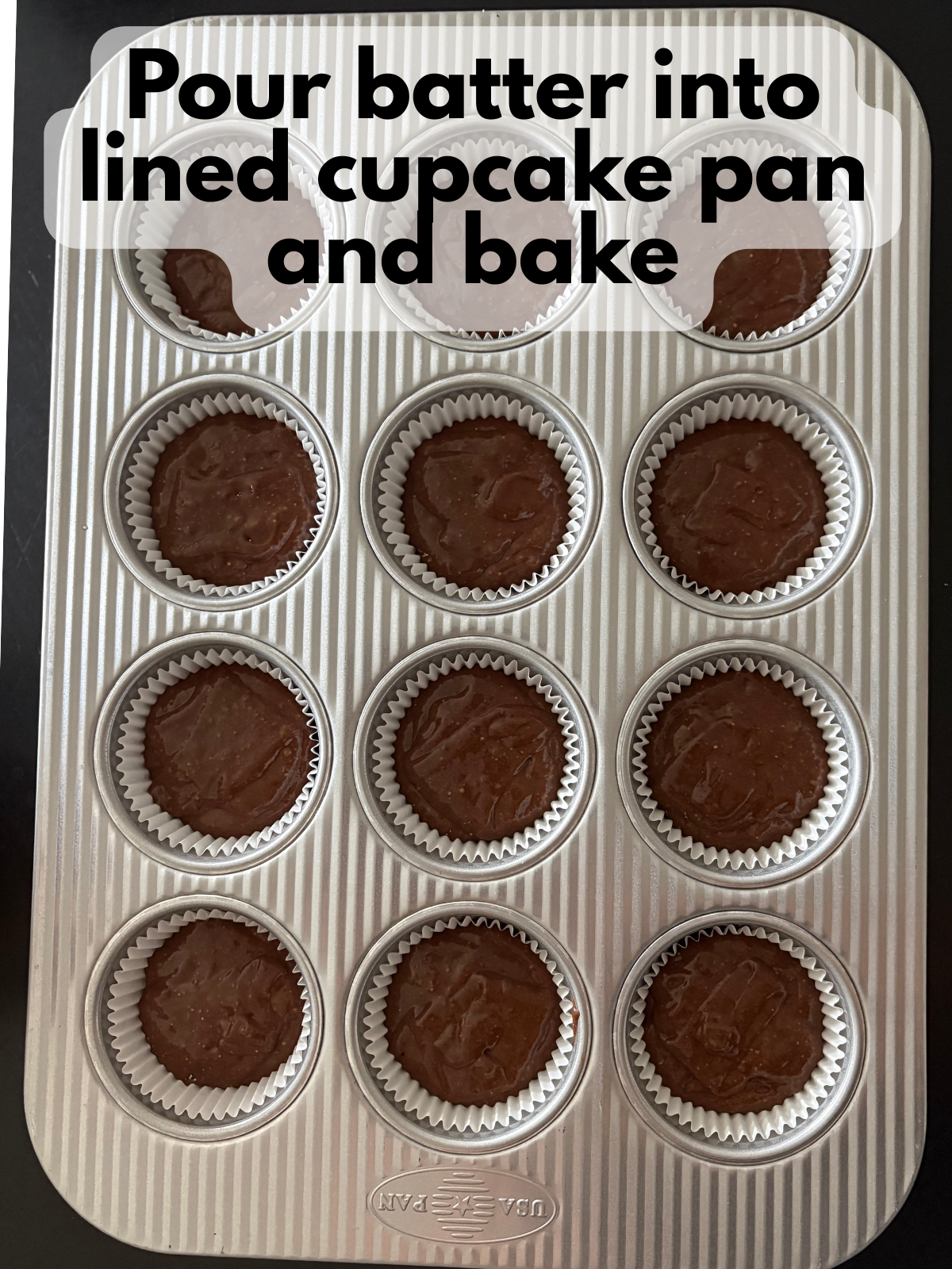 cupcake batter in a cupcake tin