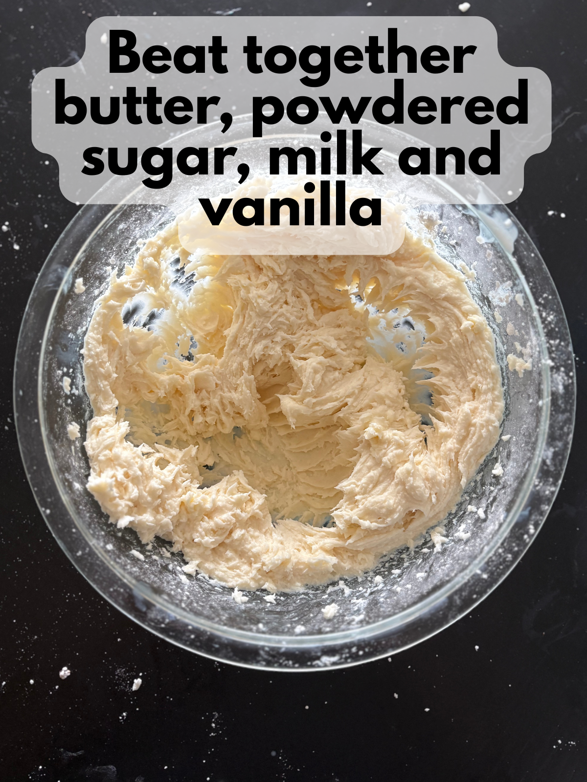 vanilla buttercream frosting in a mixing bowl