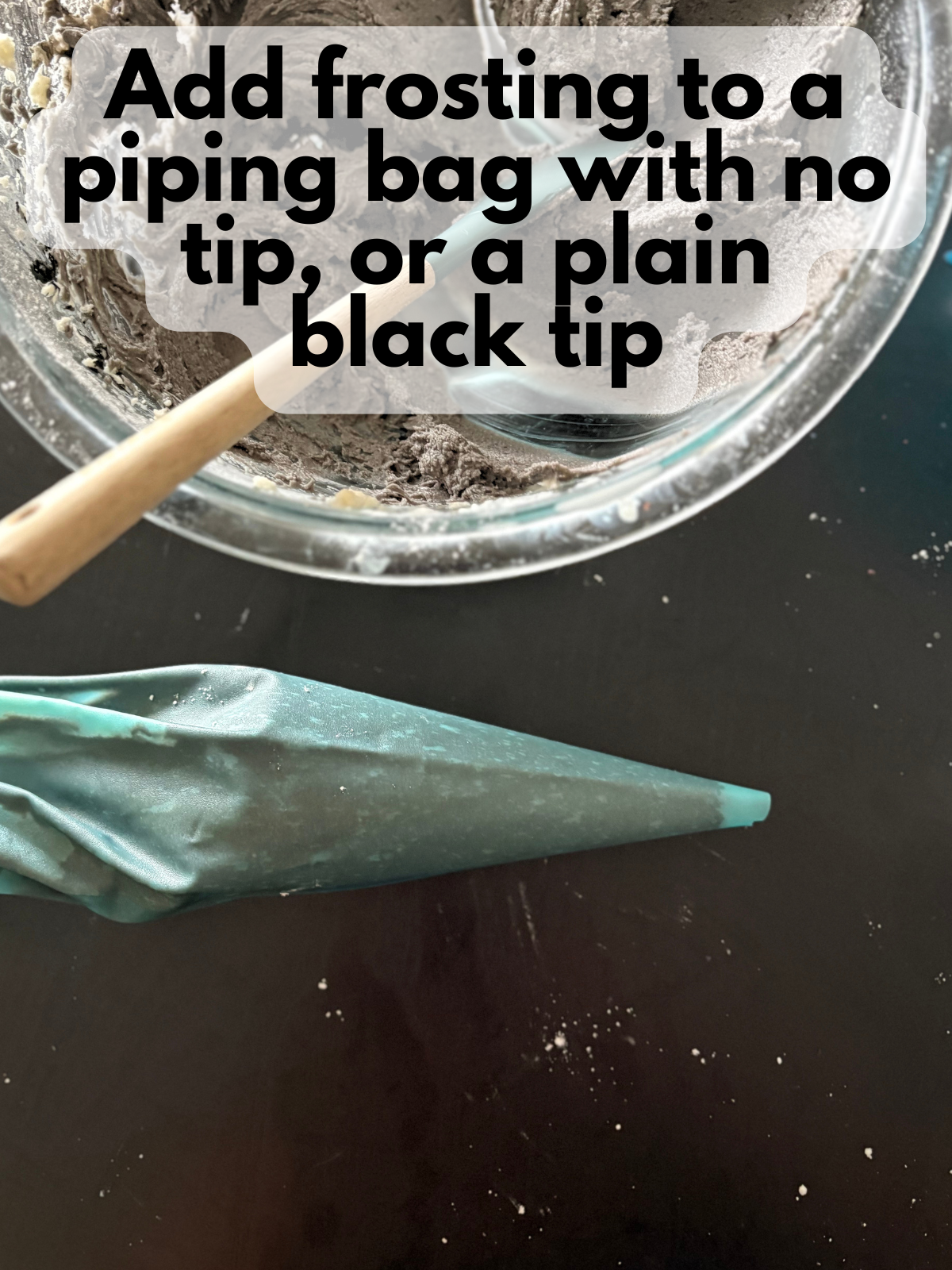 black buttercream frosting in a piping bag