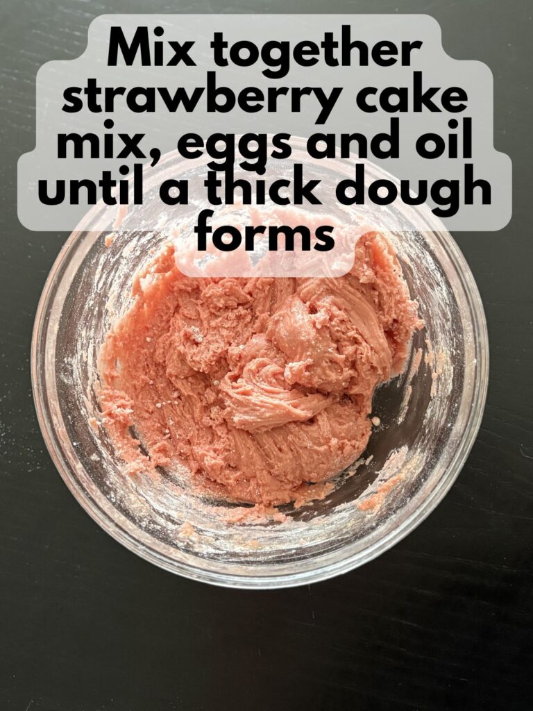 strawberry cake mix cookie dough in a bowl