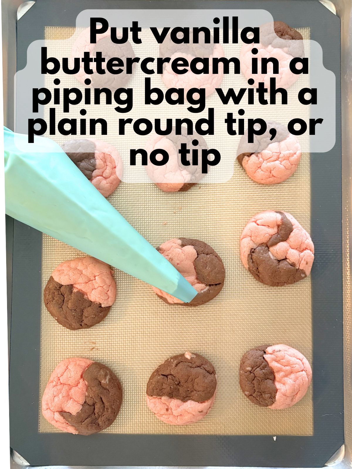 neapolitan cake mix cookies on a baking sheet, a piping bag with frosting is placed on top of them