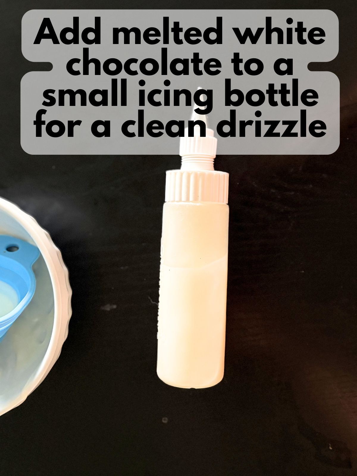 melted white chocolate in a squeeze bottle