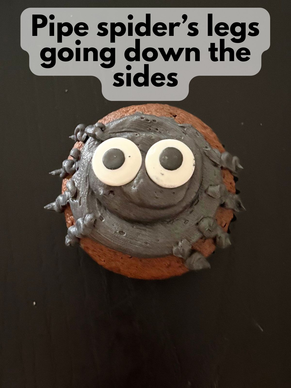 legs piped onto spider cupcake