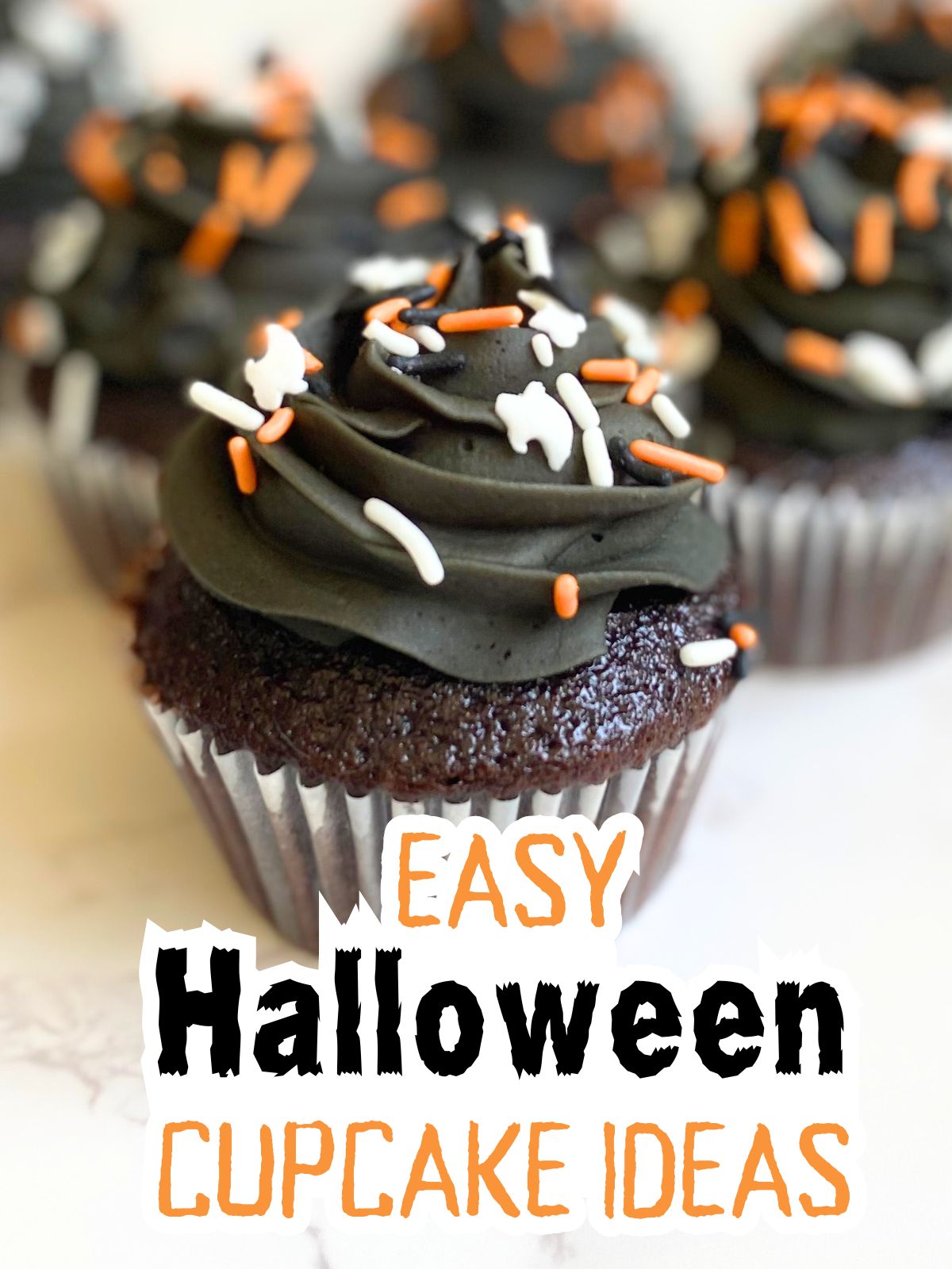 black frosted cupcakes