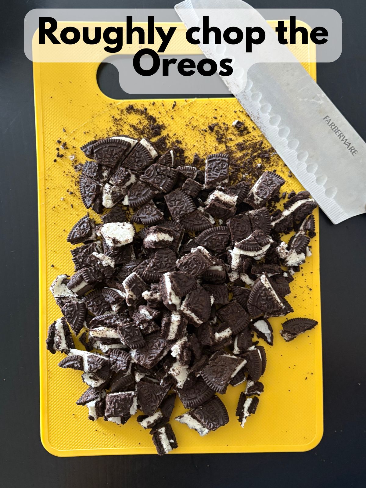 Oreos roughly chopped on a cutting board