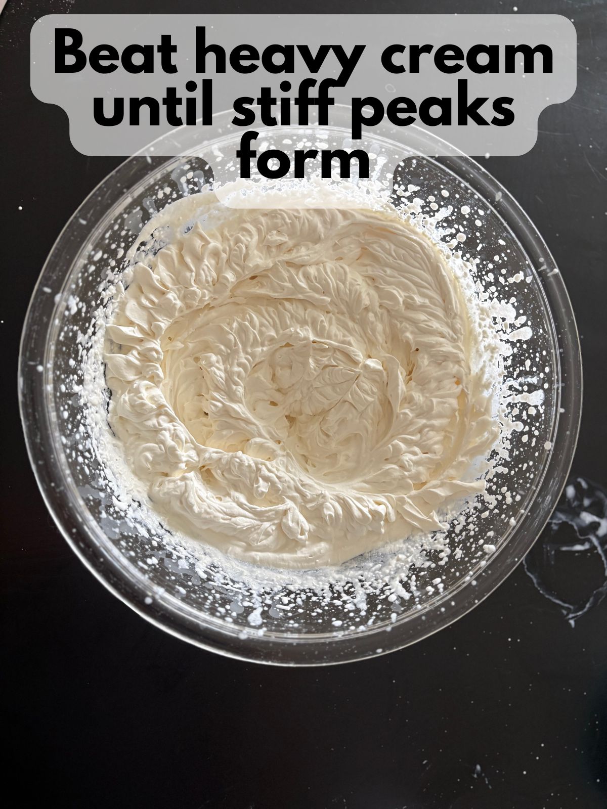 whipped cream in a large mixing bowl