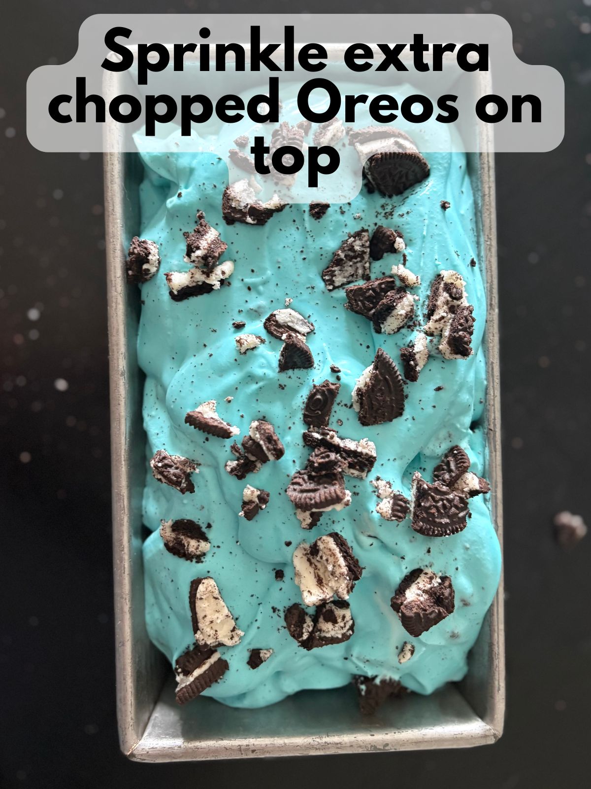 extra chopped oreos sprinkled on top of blue oreo ice cream