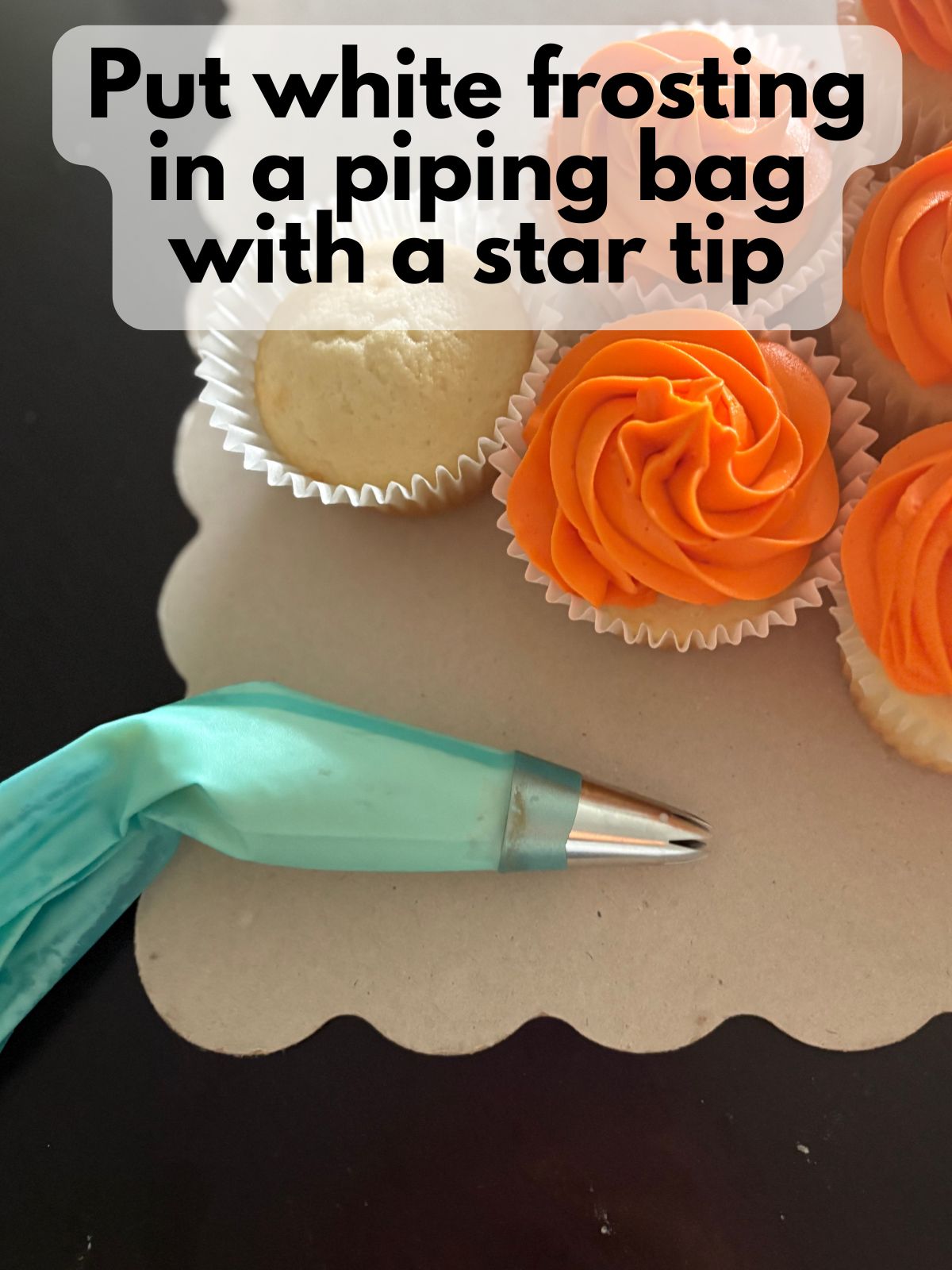white frosting in a piping bag with a star tip