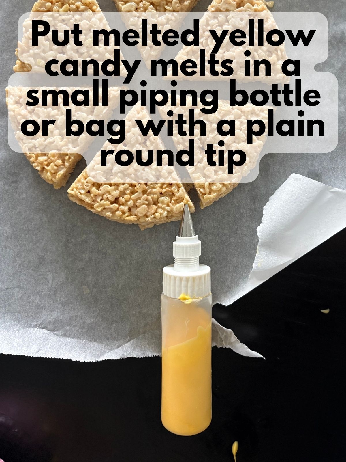 melted yellow candy melts in a small piping bottle