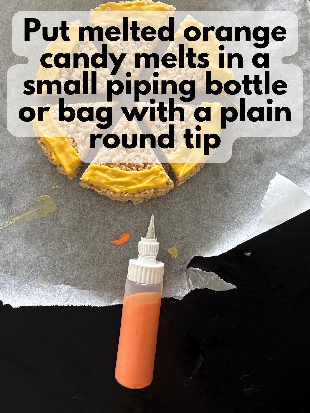 melted orange candy melts in a small piping bottle