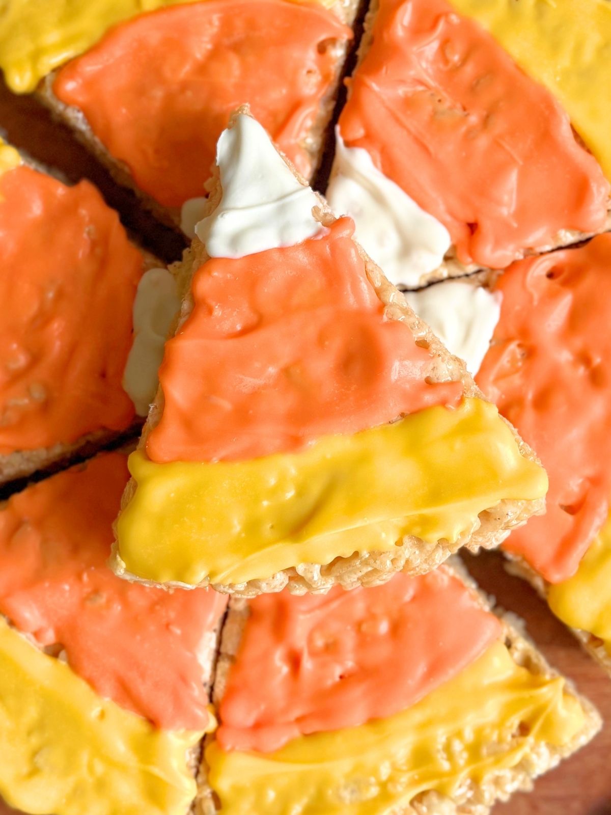 candy corn rice krispie treats on a platter