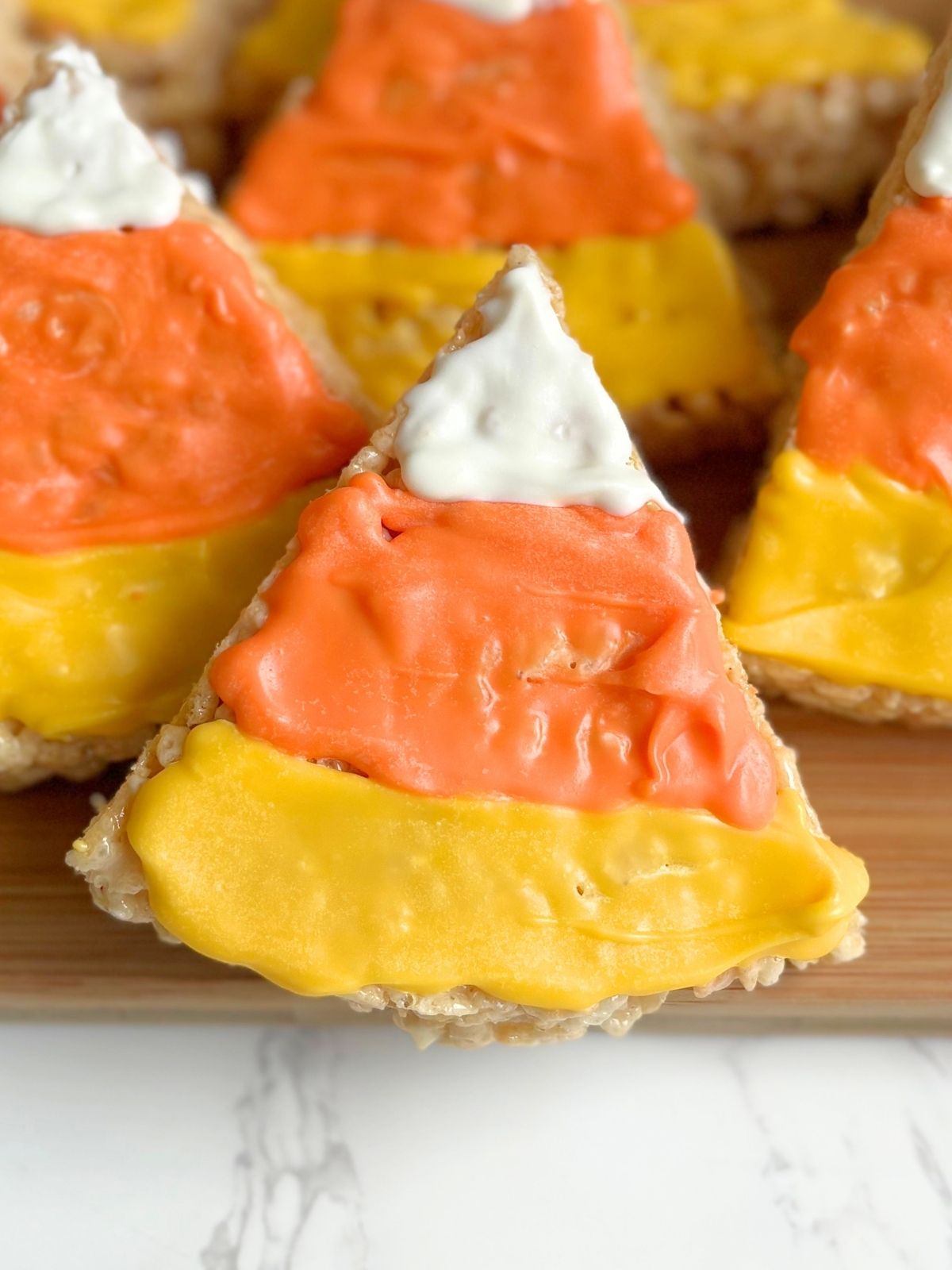 candy corn rice krispie treats on a platter